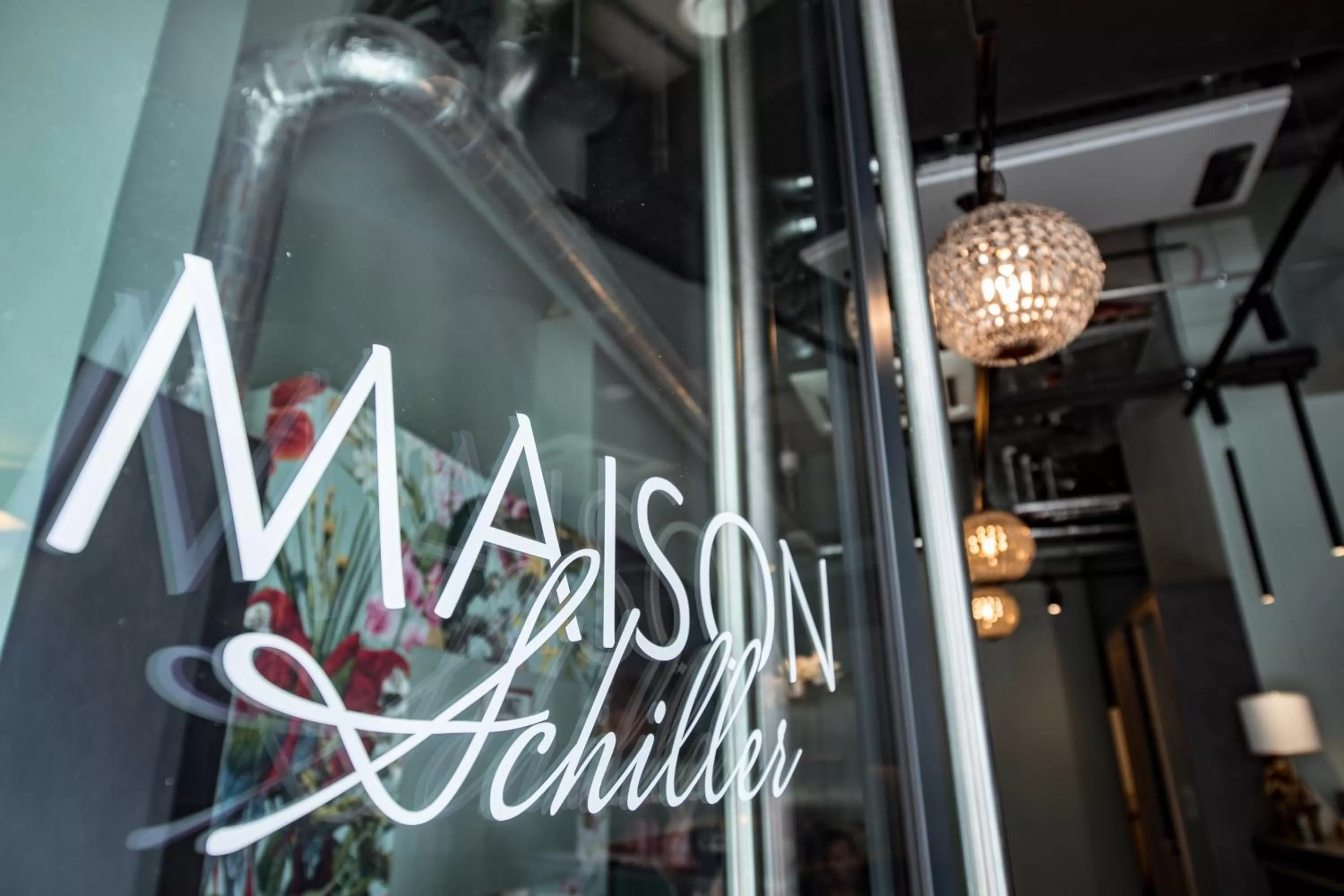 Property logo or sign in Maison Schiller by DesignCity Hotels