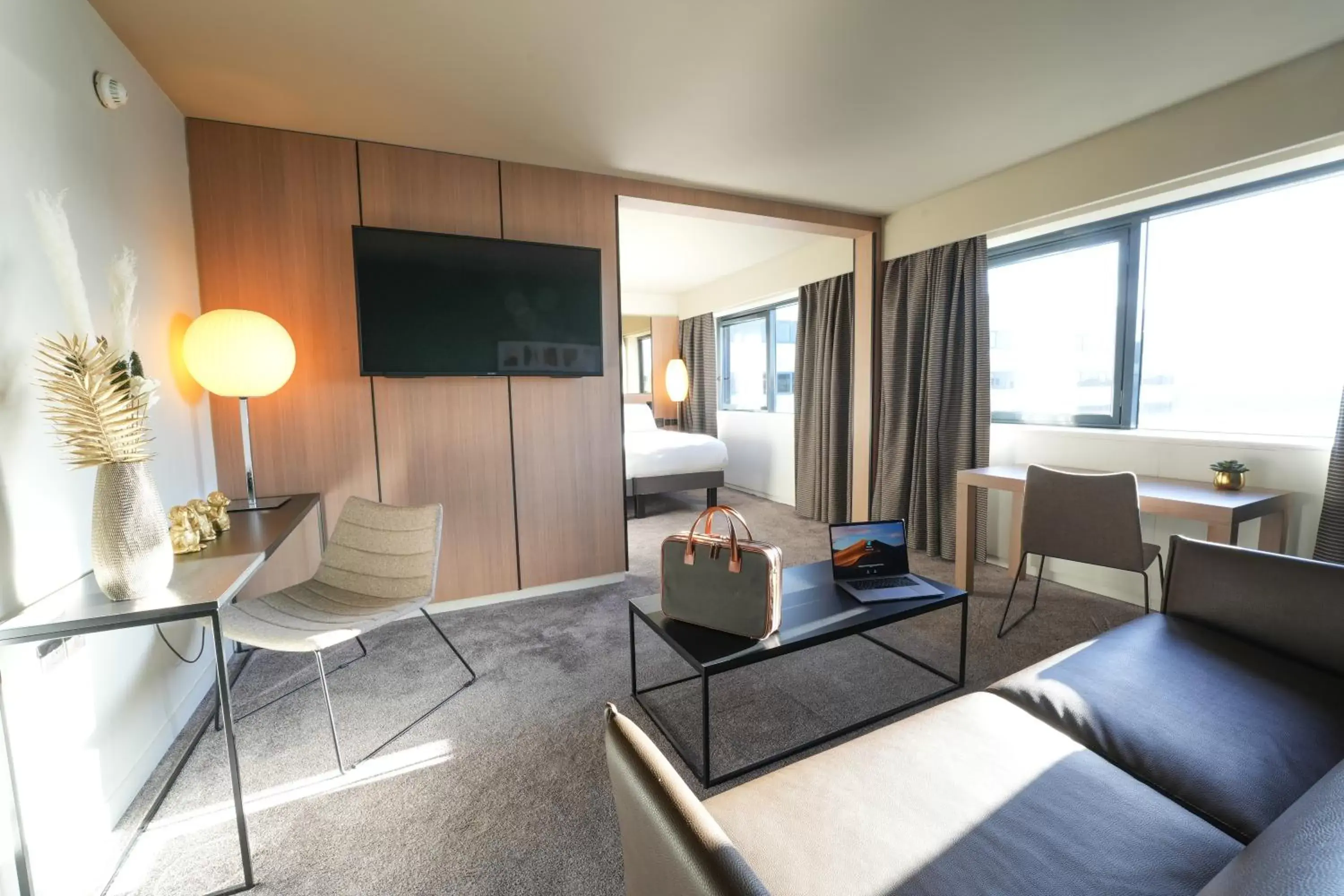 Junior King Suite with Lounge in Pullman Bordeaux Lac Junior King Suite with Lounge in Pullman Bordeaux Lac