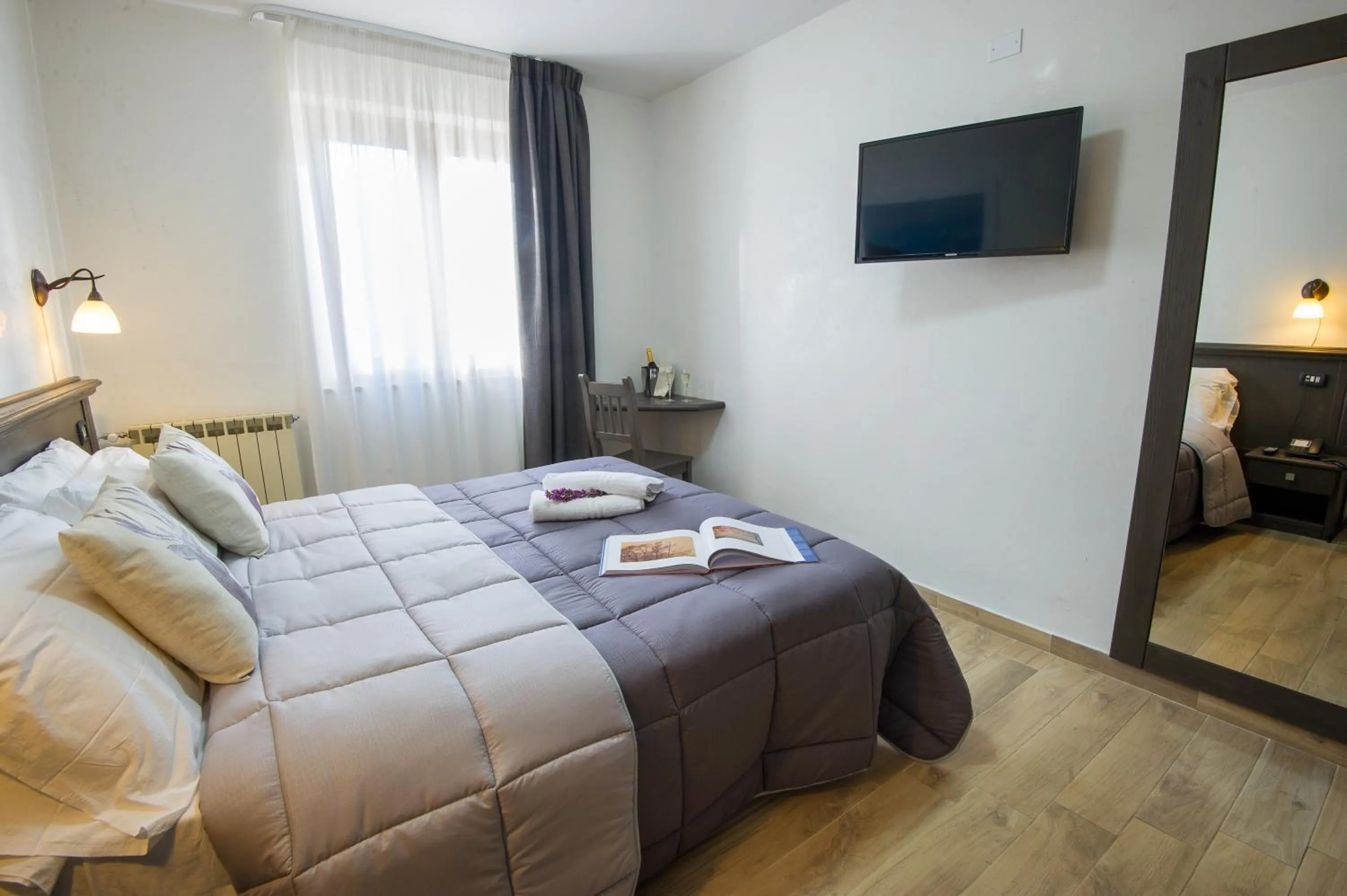 Photo of the whole room, Bed in Hotel Iris