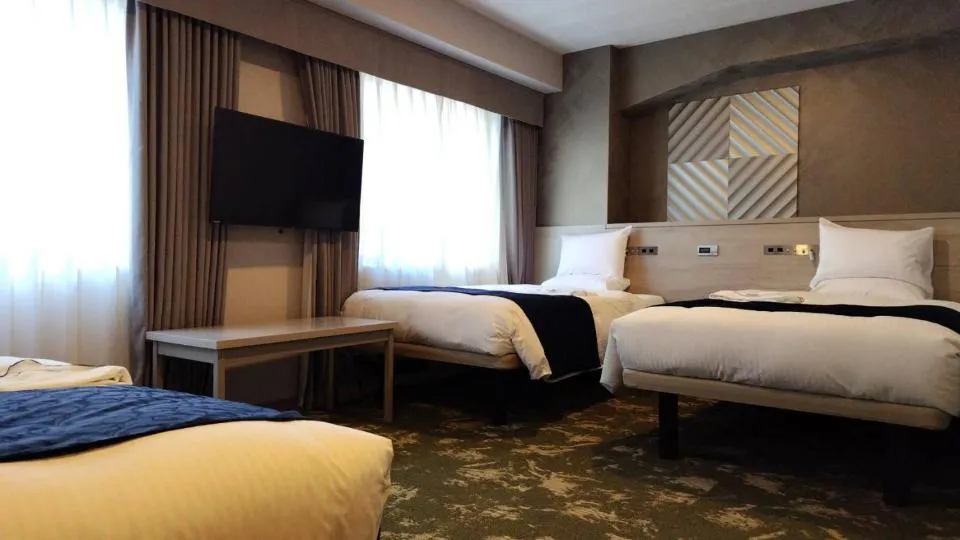 Bed in Hotel Rose Garden Shinjuku