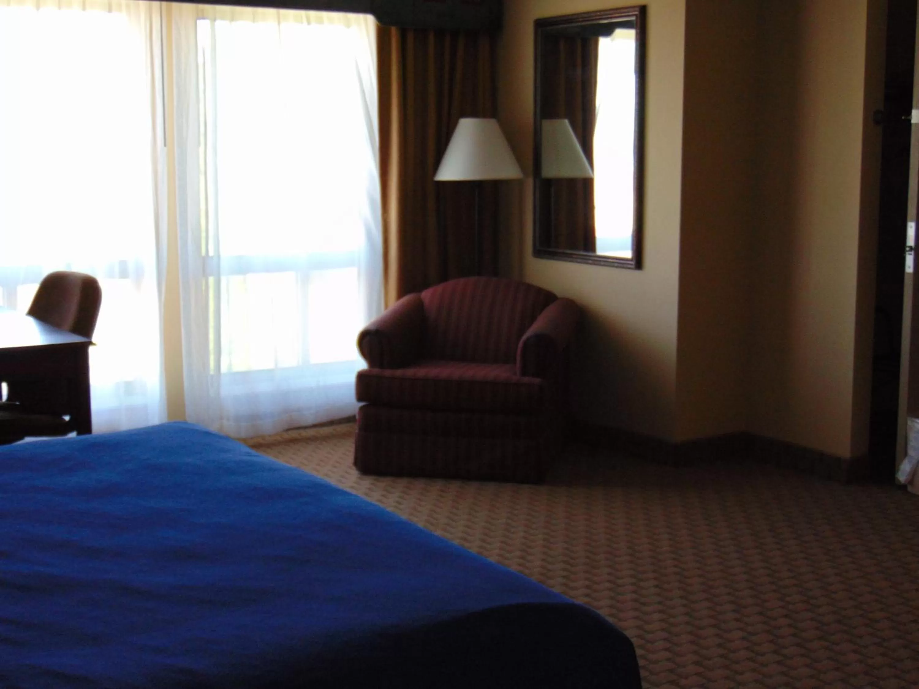Seating area, Bed in Horse Creek Inn