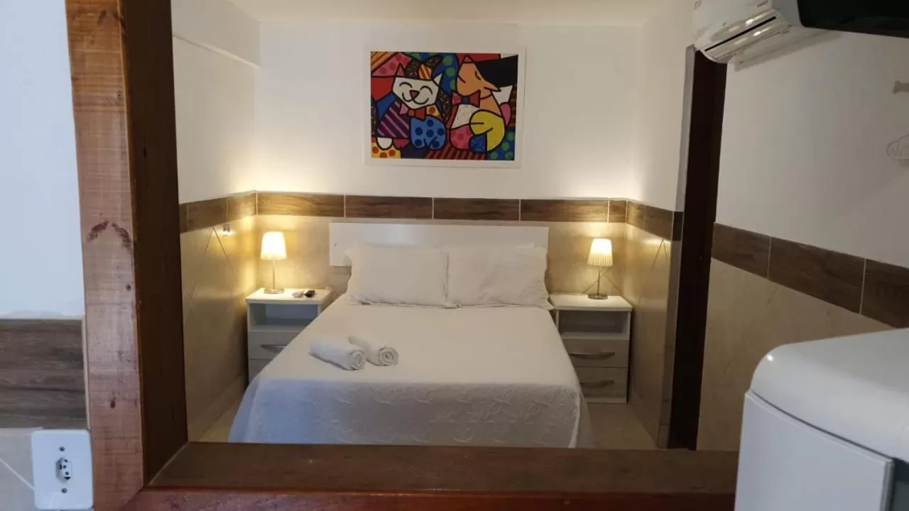 Bed in Pousada Itapuã RS