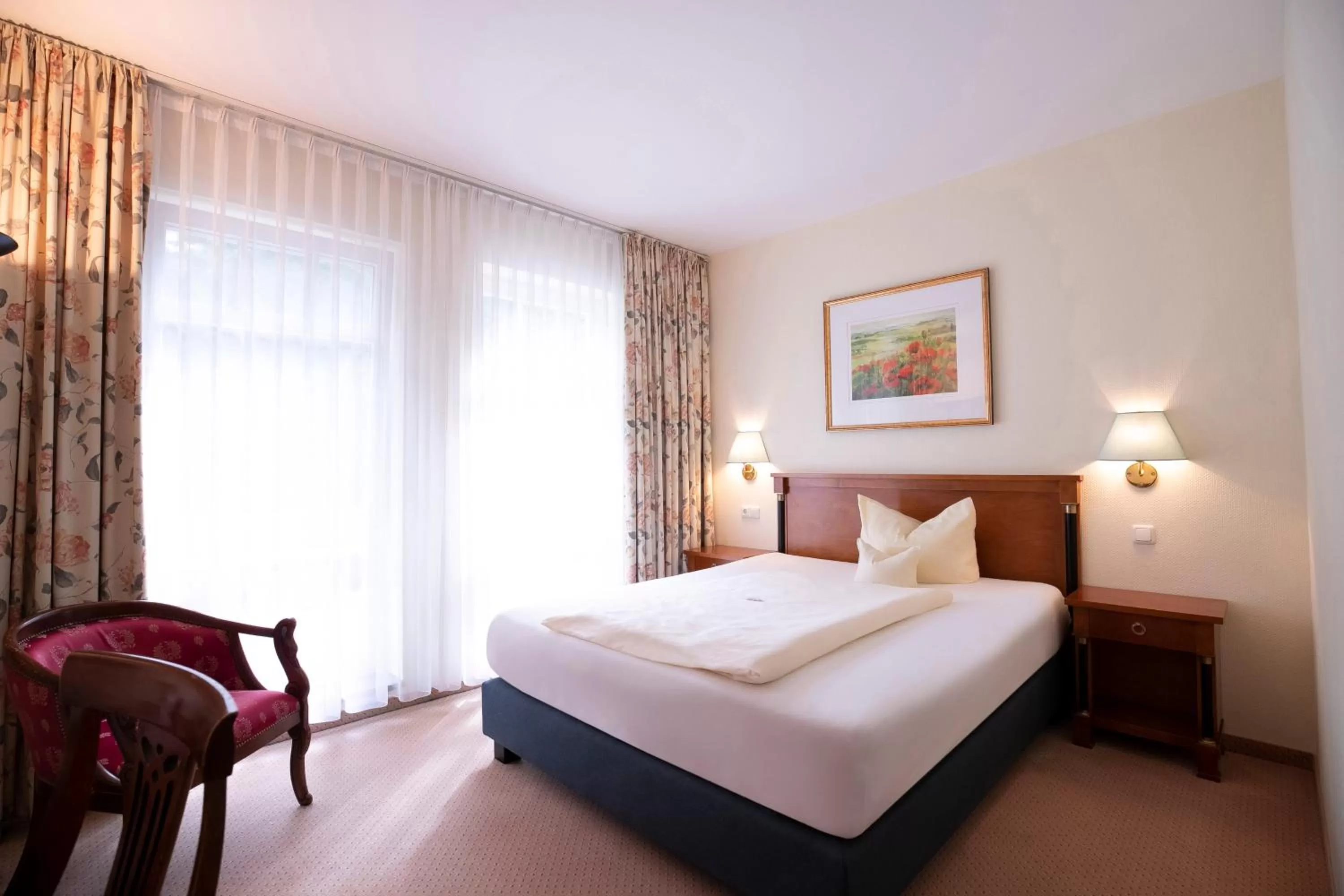 Photo of the whole room, Bed in Kurhaus am Inselsee