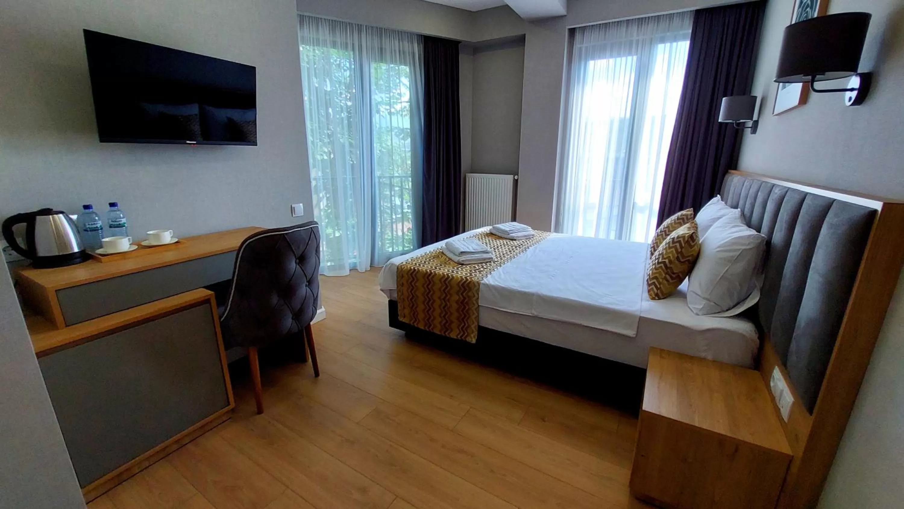 Photo of the whole room, Bed in Falcon Boutique Hotel