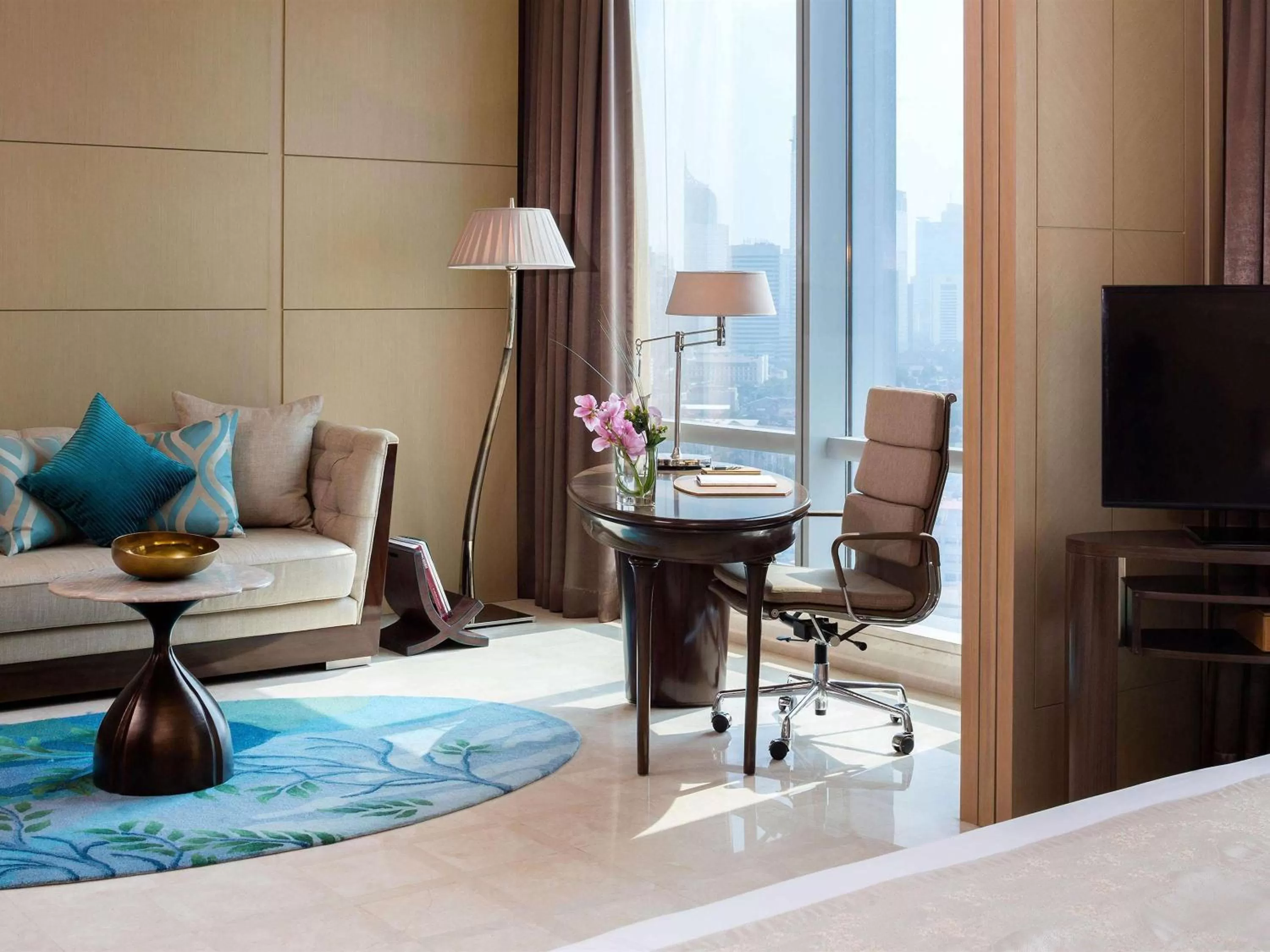 Photo of the whole room, Bed in Raffles Jakarta