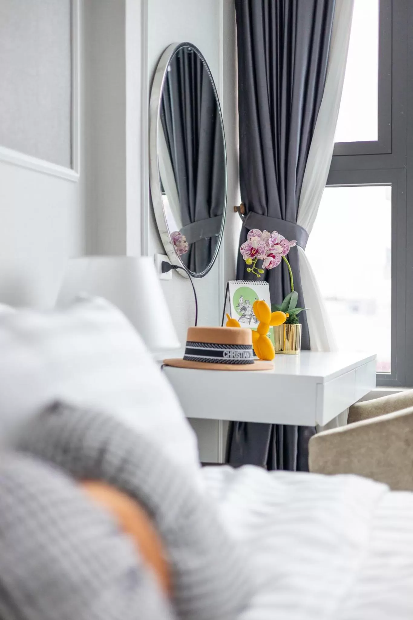 Bed in Ivy Hotel & Apartment