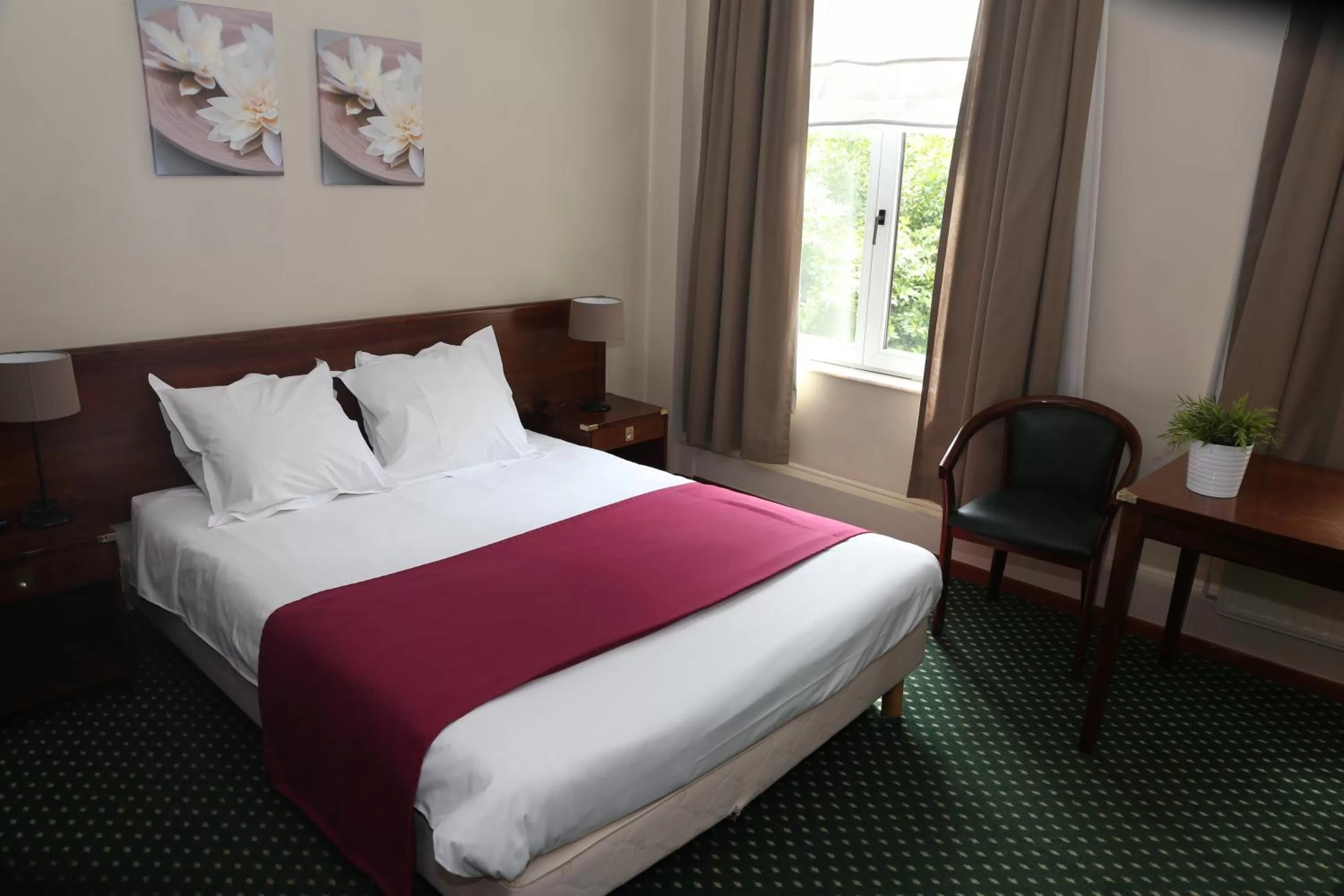 Bed in Boutique Hôtel Le Monte-Cristo