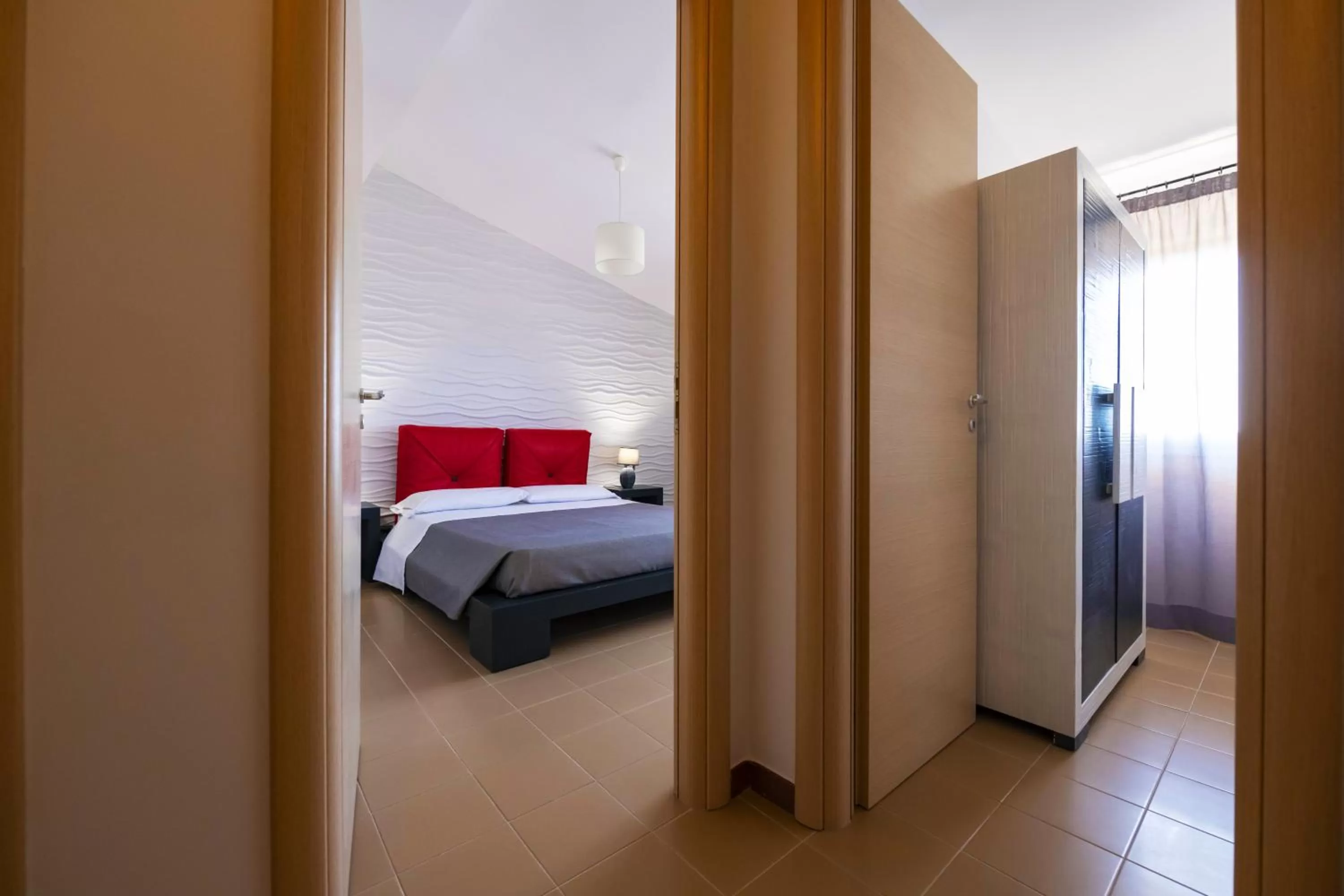 Bed in Aparthotel Isabella