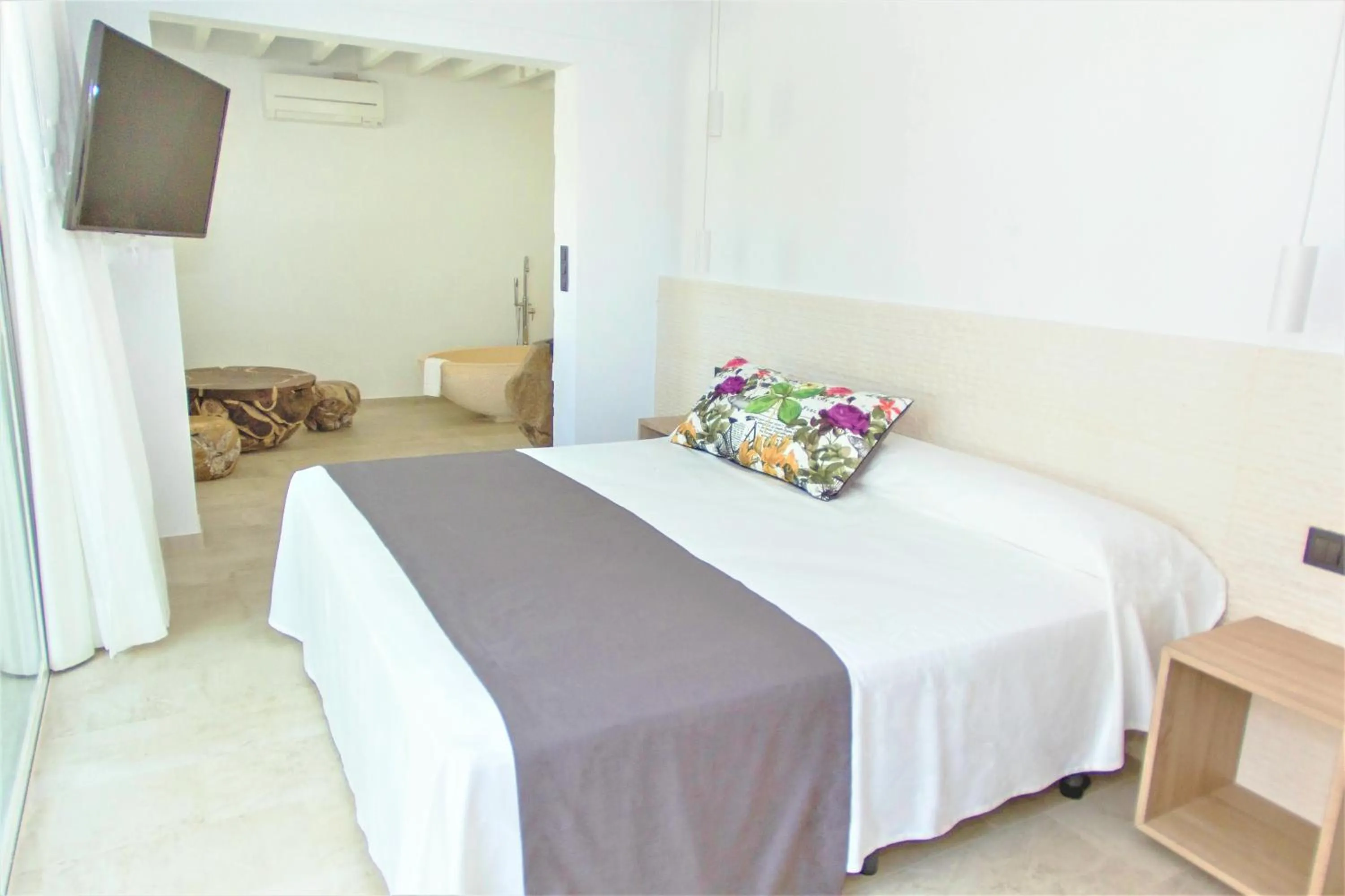 Bed in Botaniq Hotel Boutique