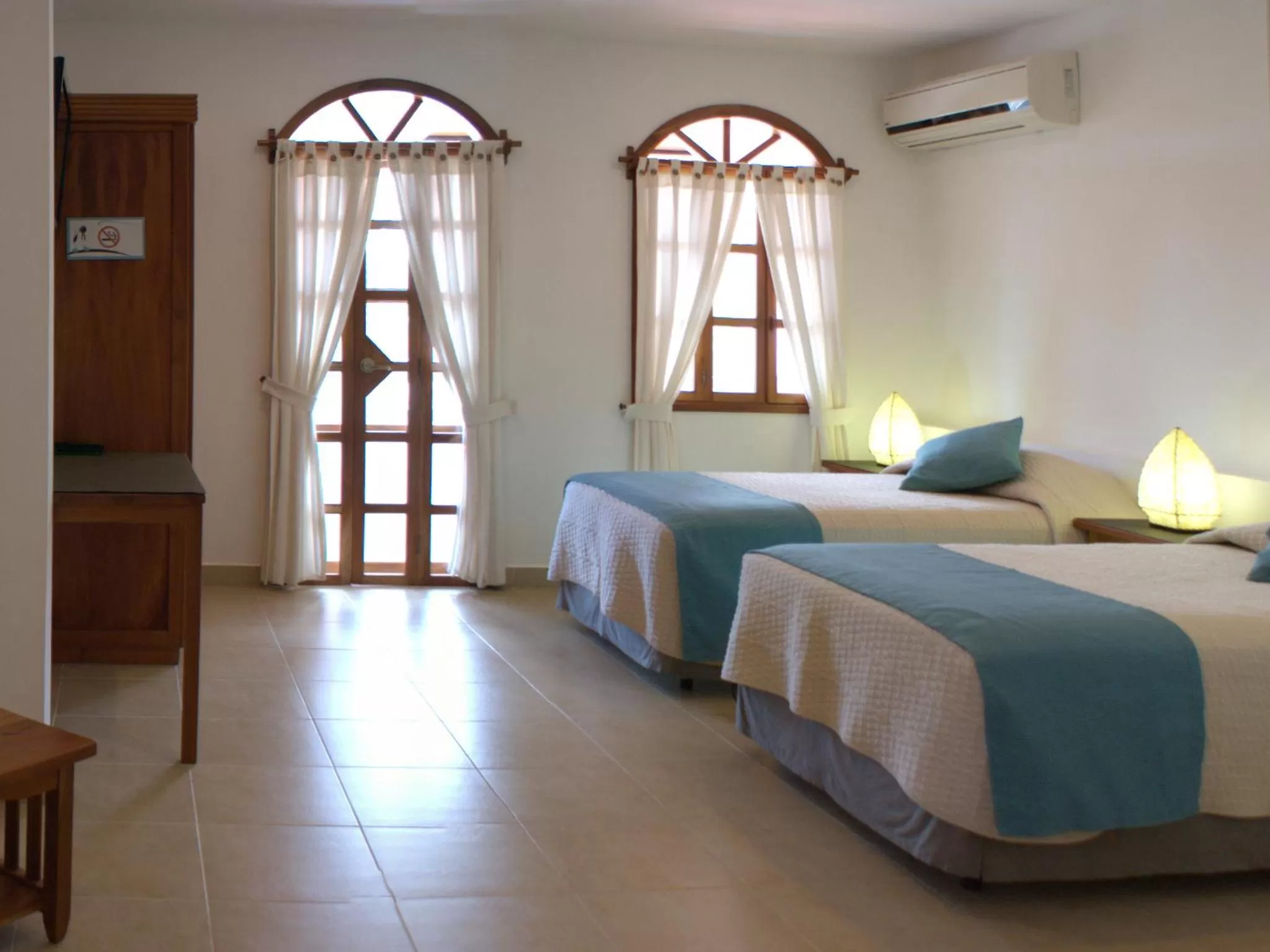 Bedroom, Bed in Hotel Galapagos Suites B&B