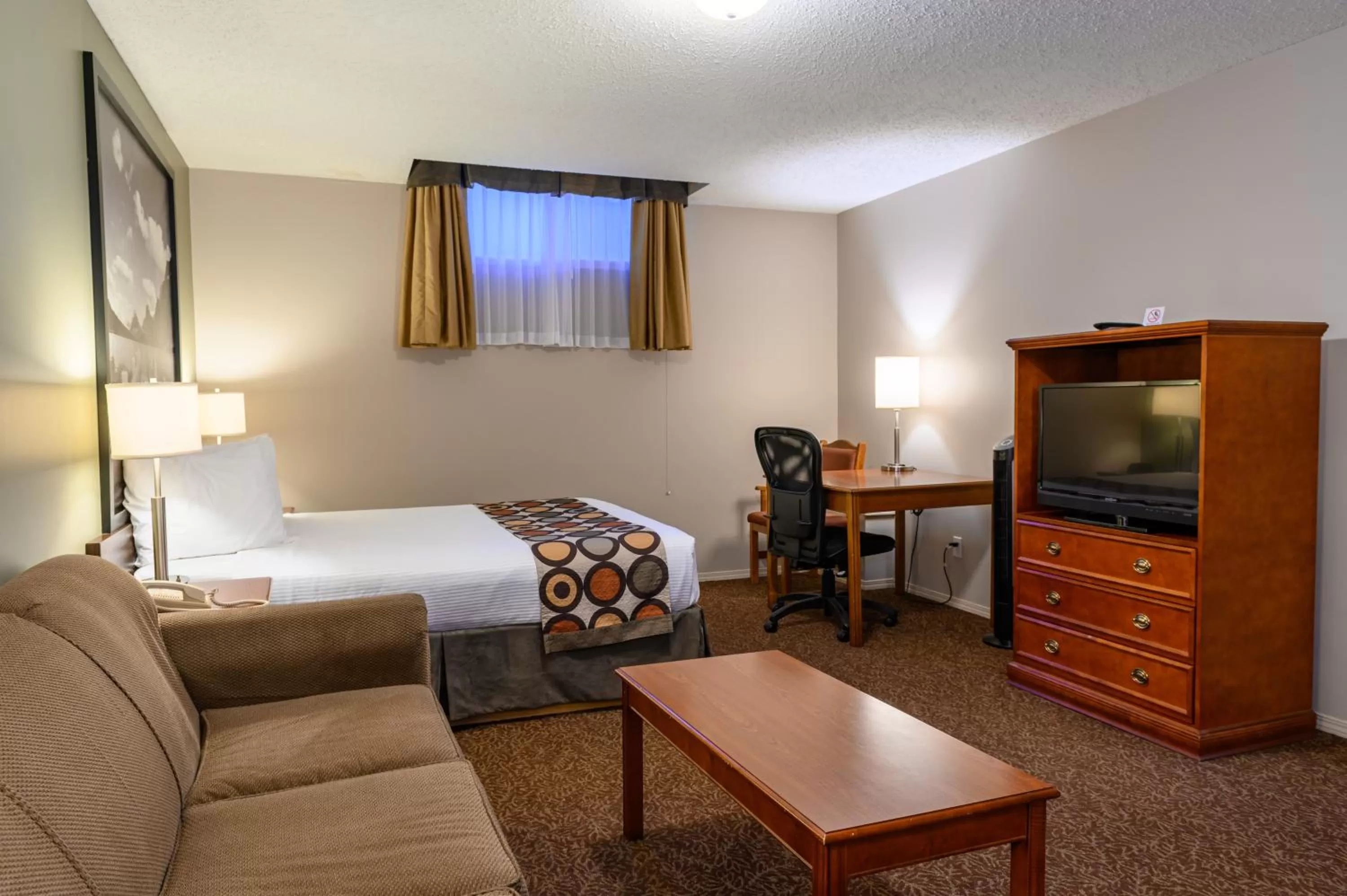 Bed in Super 8 by Wyndham Cochrane