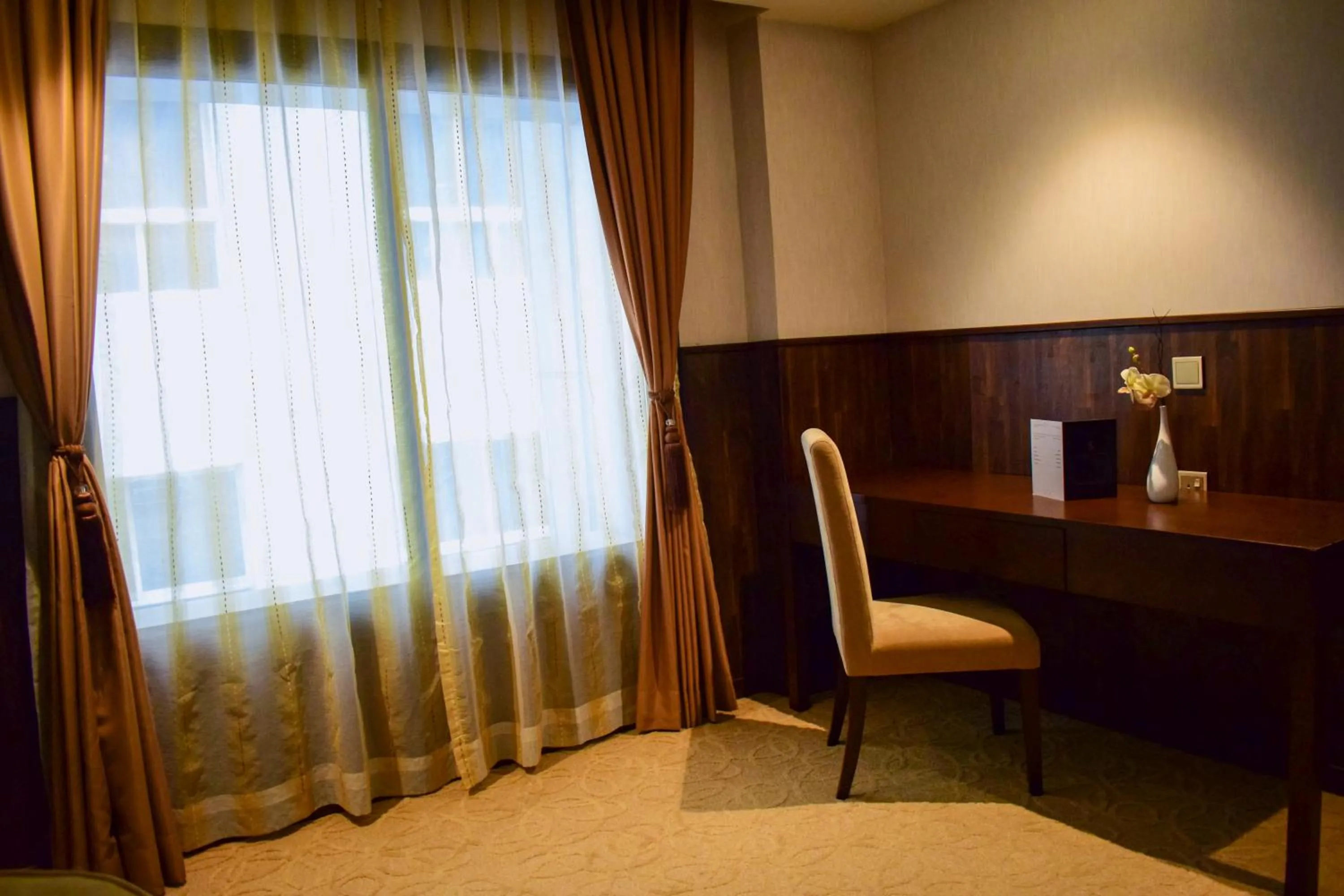 Bedroom in The Secure Inn Hotel Muscat