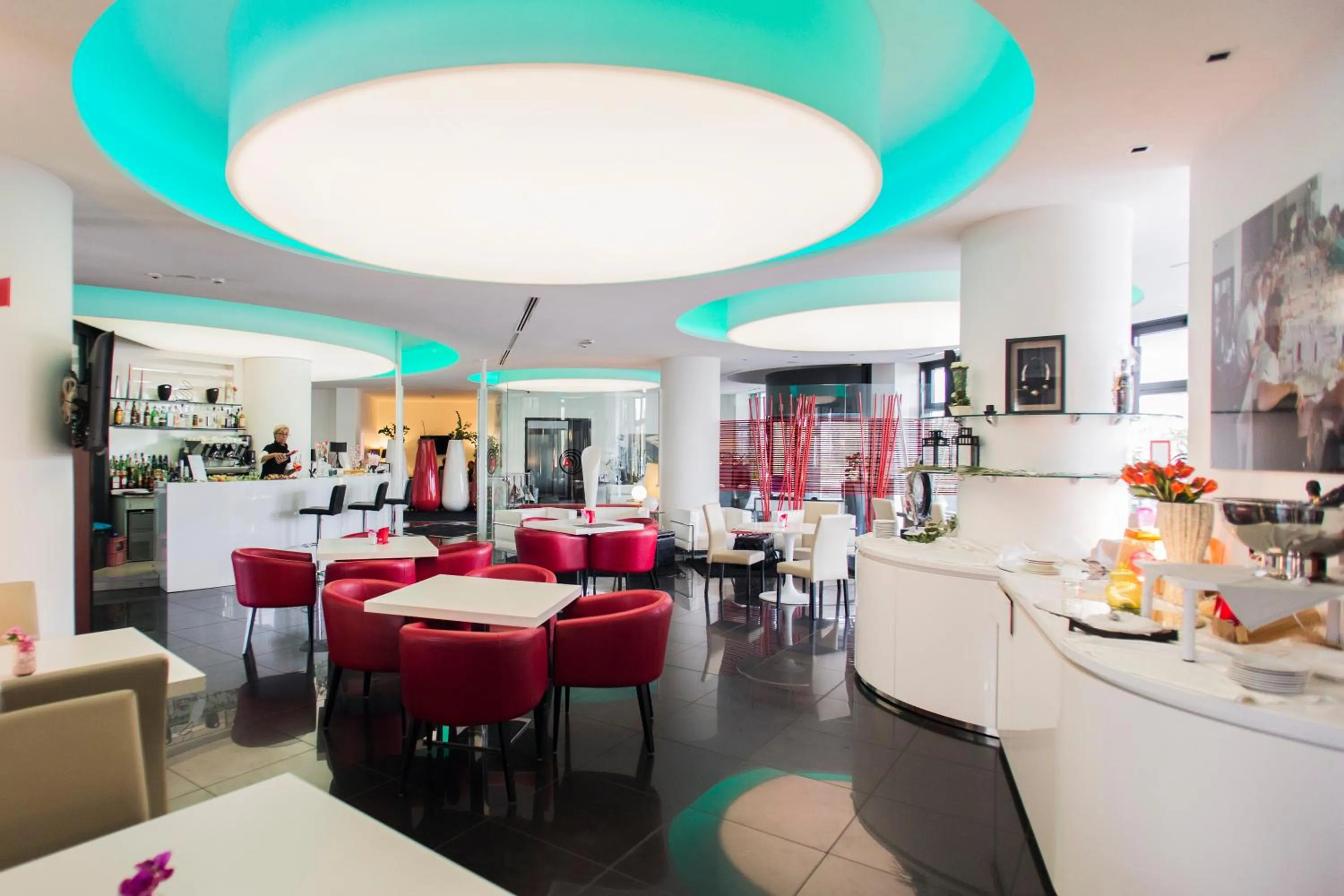 Communal lounge/ TV room in Amatì Design Green Hotel