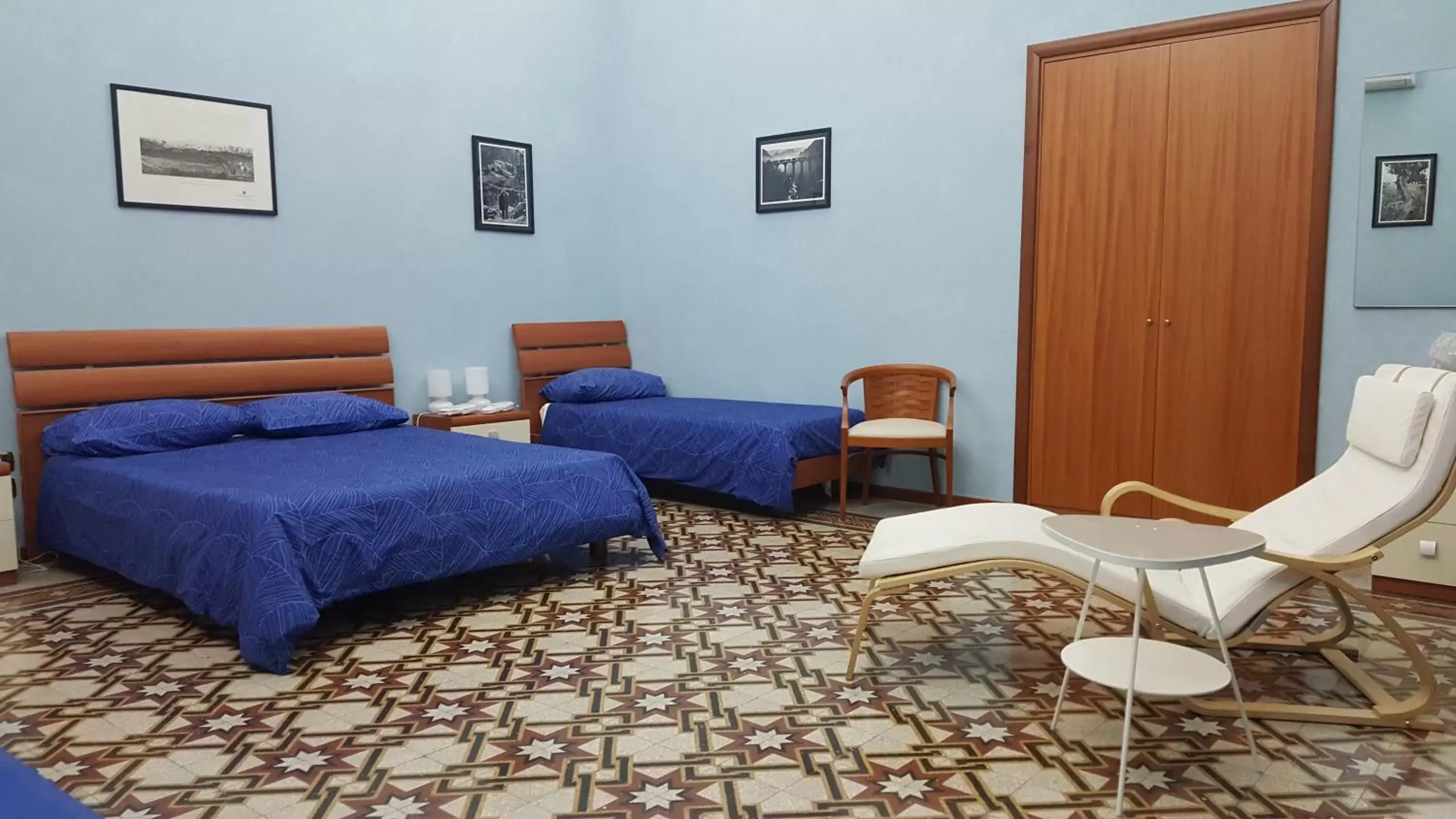 Triple Room with Balcony in Affittacamere Conte Di Cavour Triple Room with Balcony in Affittacamere Conte Di Cavour