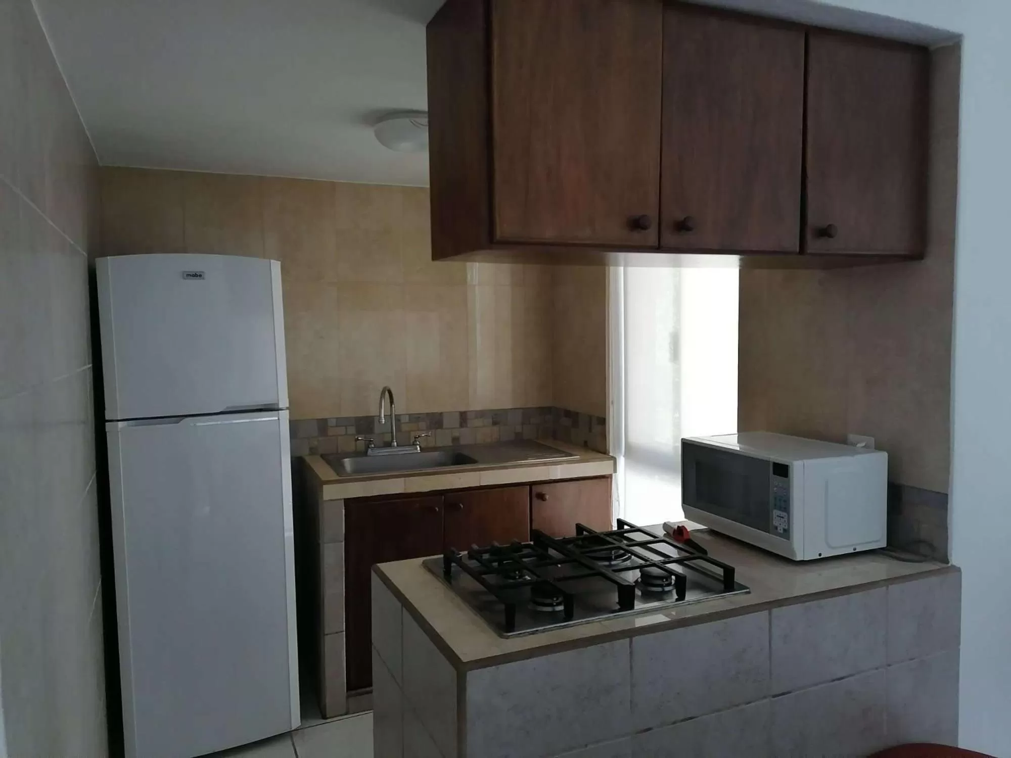 kitchen in Villas del Palmar Manzanillo with Beach Club