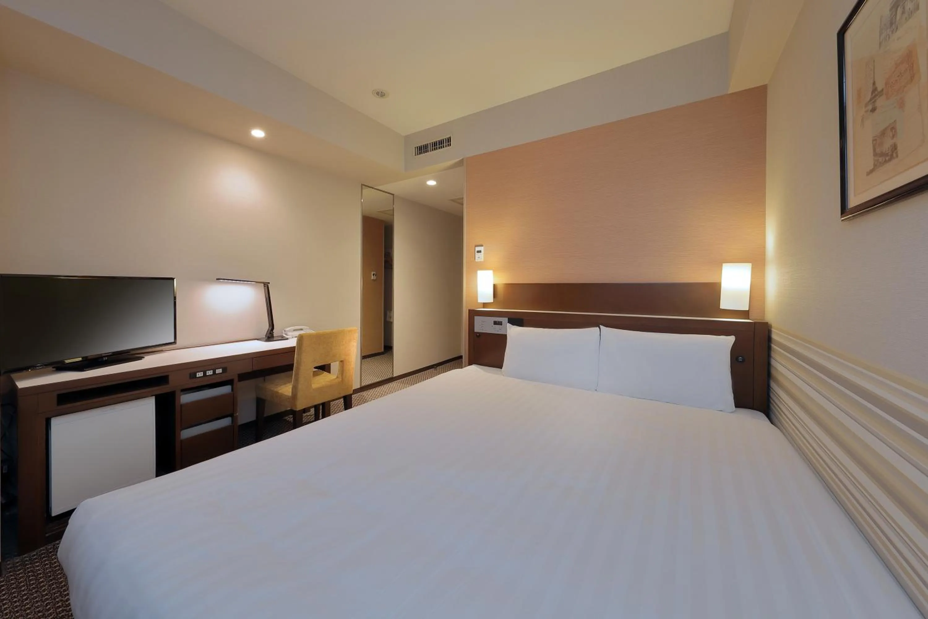 Bed in Keio Presso Inn Shinjuku