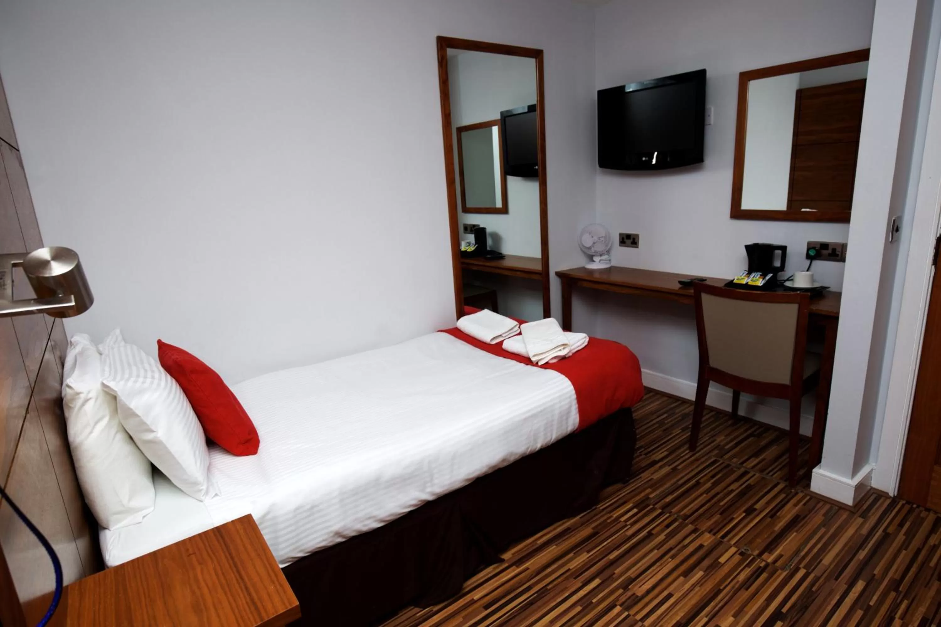 Bed in Cocoon @ International Inn + Apartments