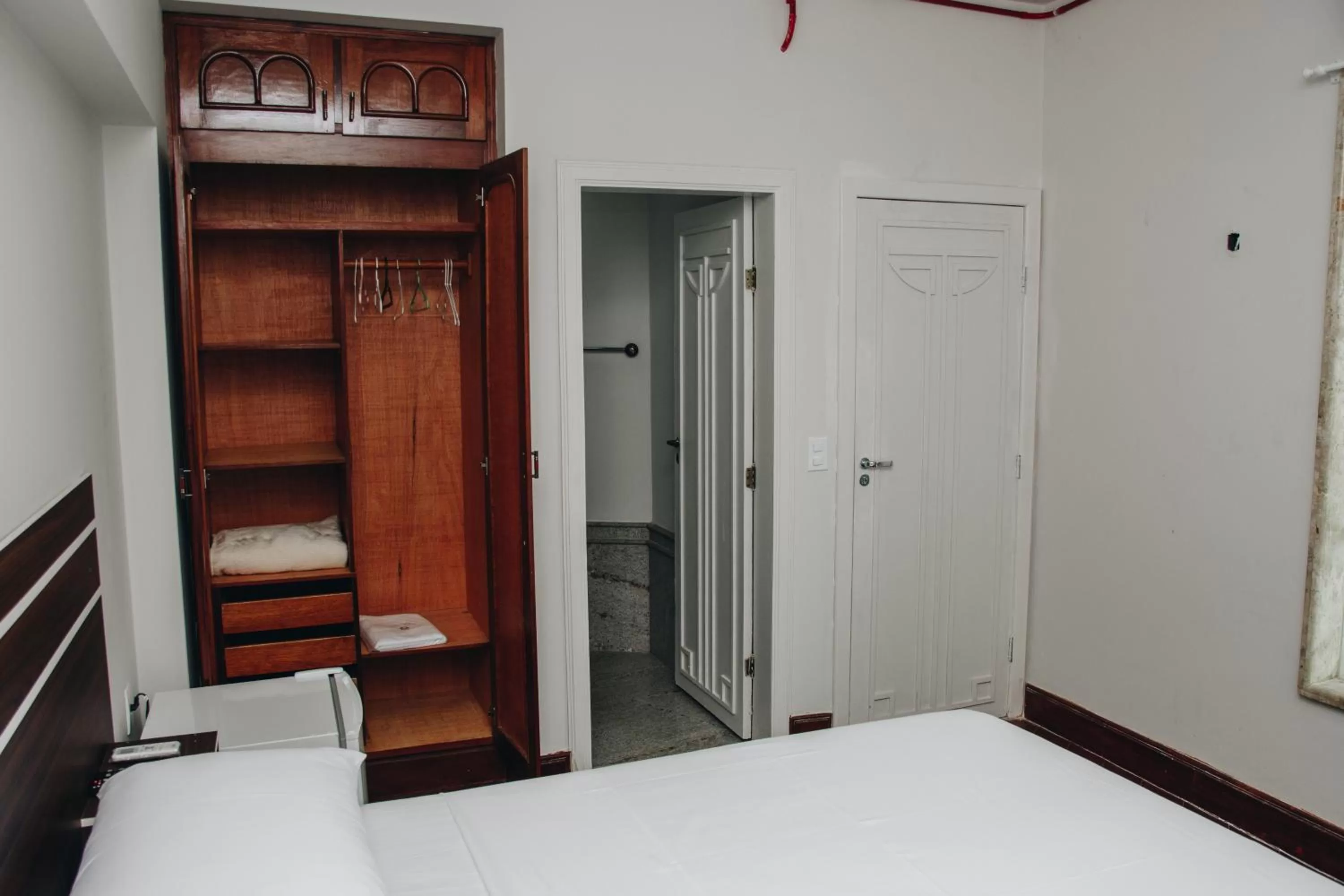 Bed in SAMIR HOTEL COMFORT