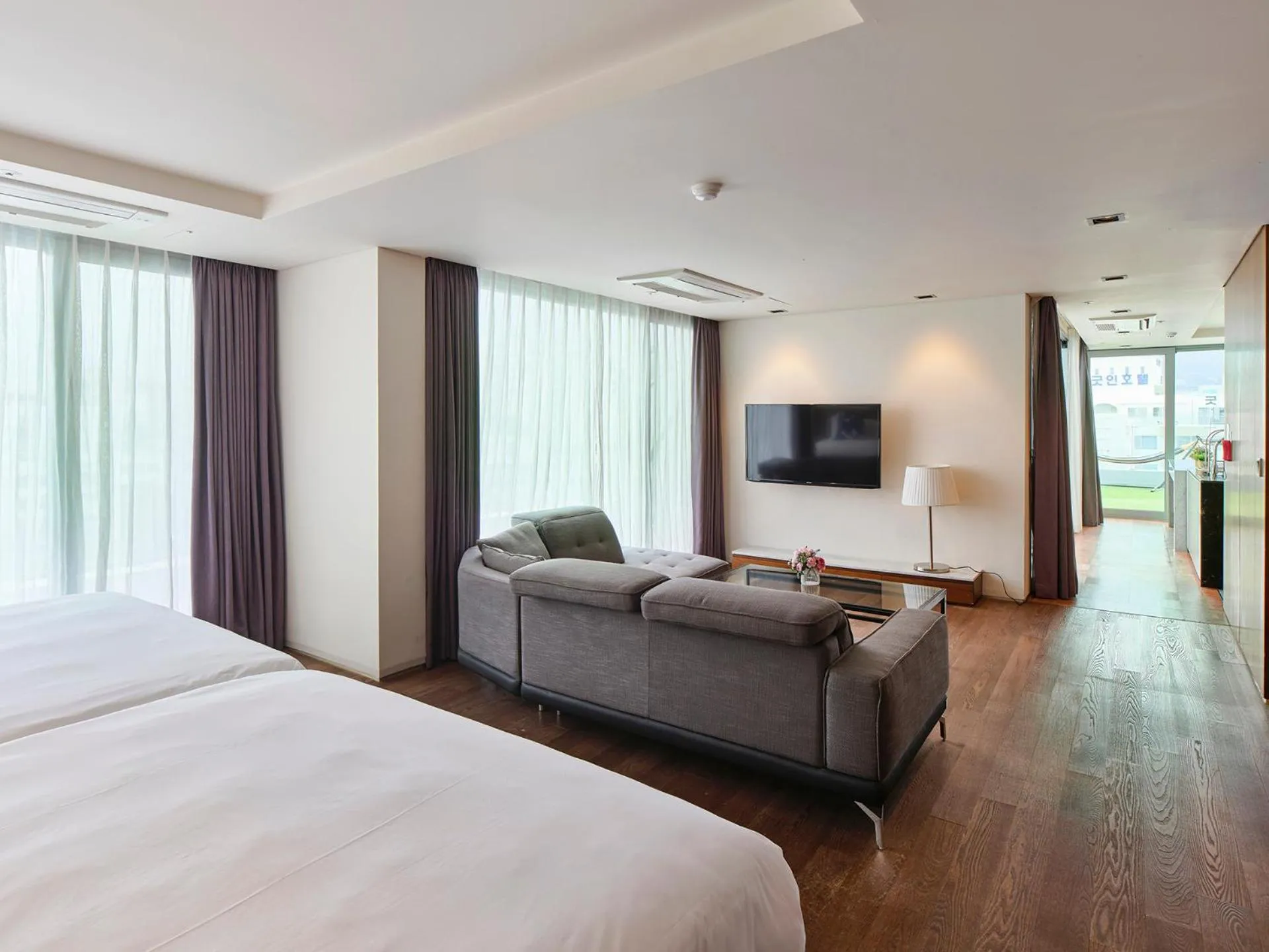 Bed in The Island Blue Hotel