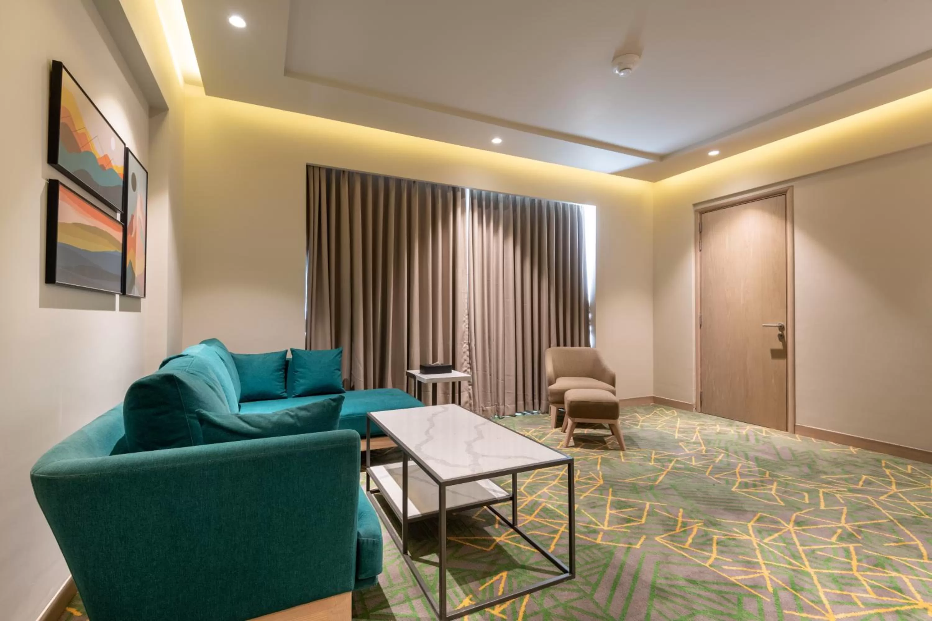 Living room in Holiday Inn Katra Vaishno Devi by IHG