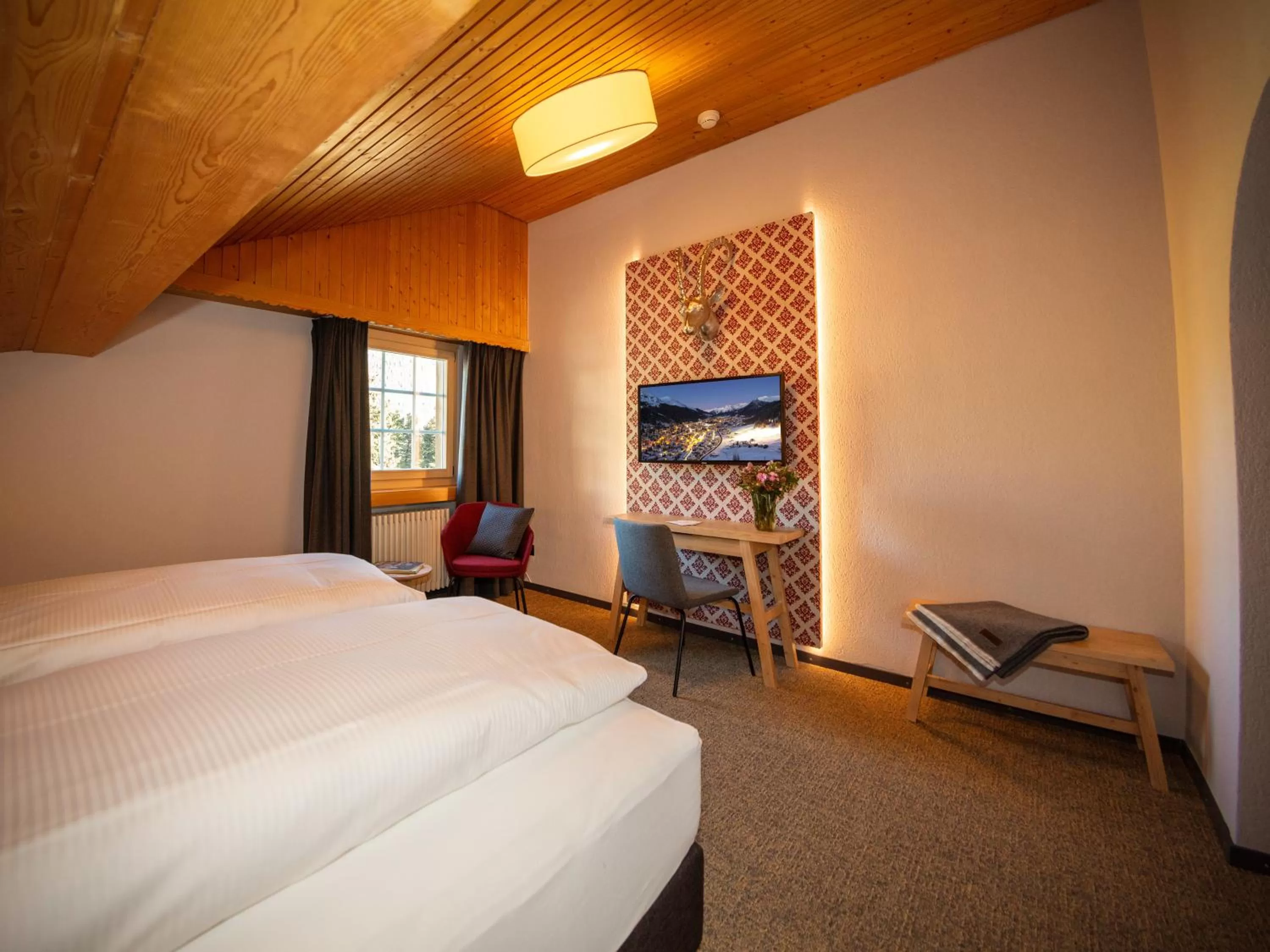 Photo of the whole room, Bed in Hotel Parsenn