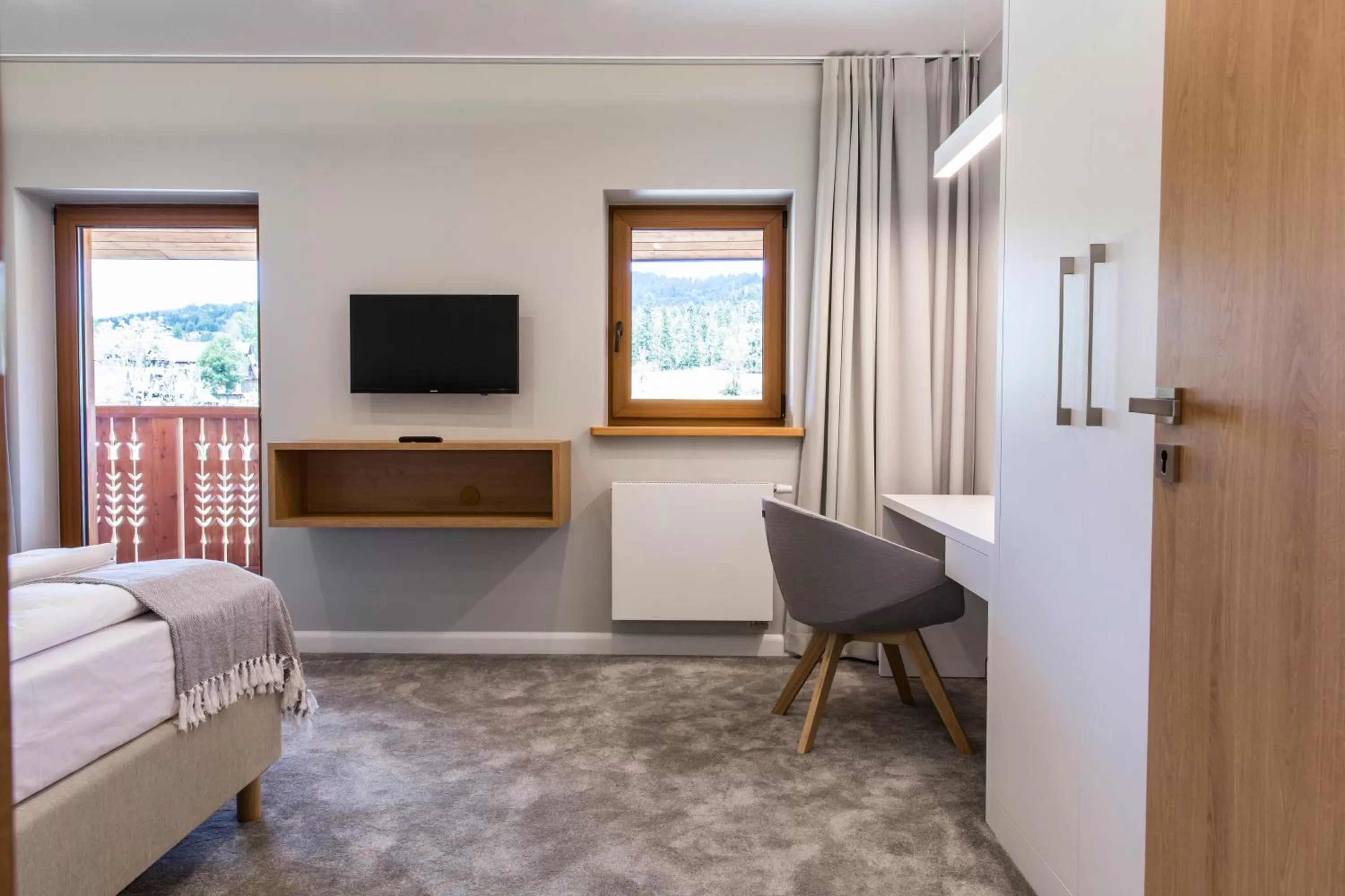 Seating area, Bed in Royal Hill Residence