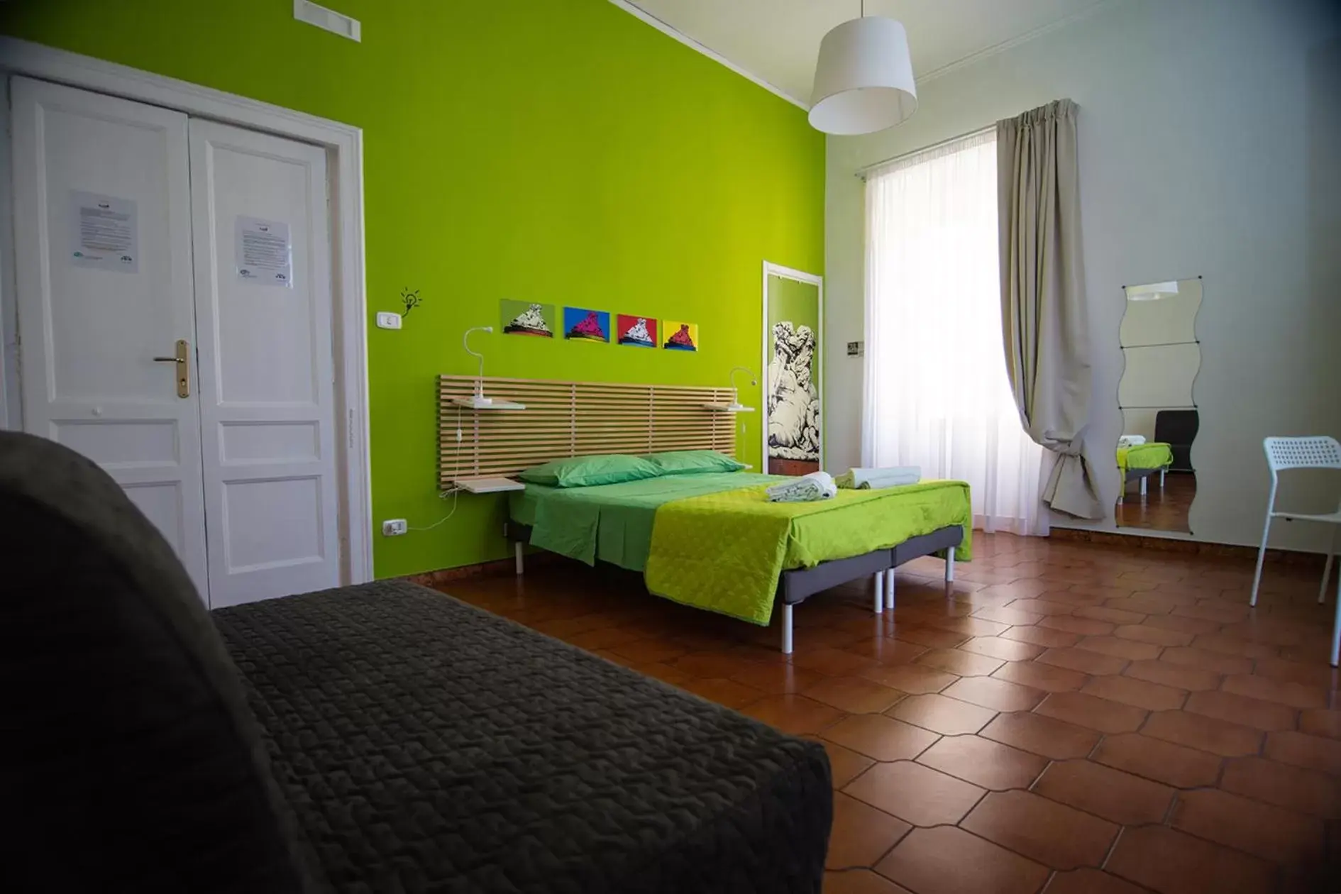 Quadruple Room in B&B Tarumbò Quadruple Room in B&B Tarumbò