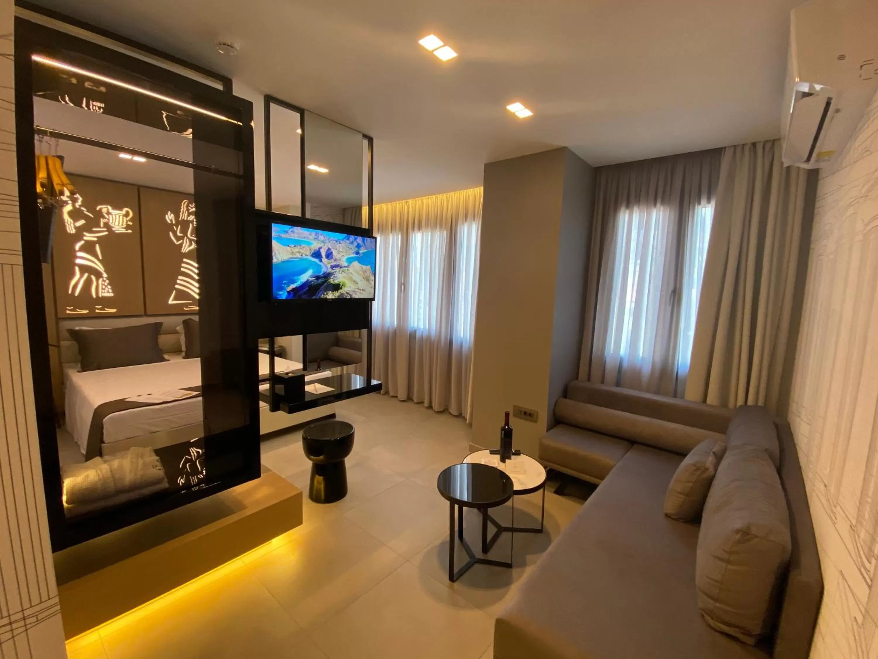 Living room, Bed in Lavris City Suites