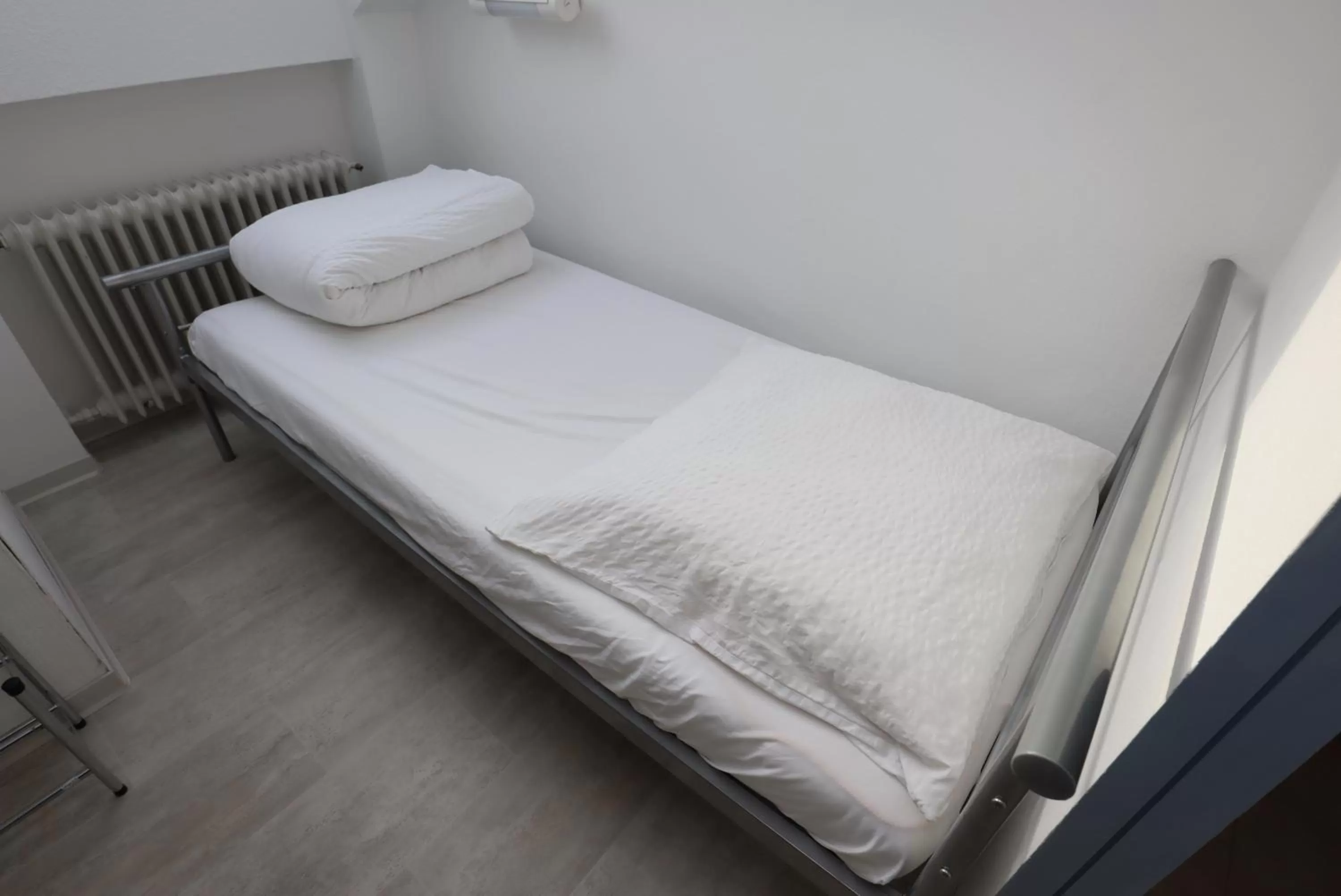 Bed in Hotel Sonnenhof Garni