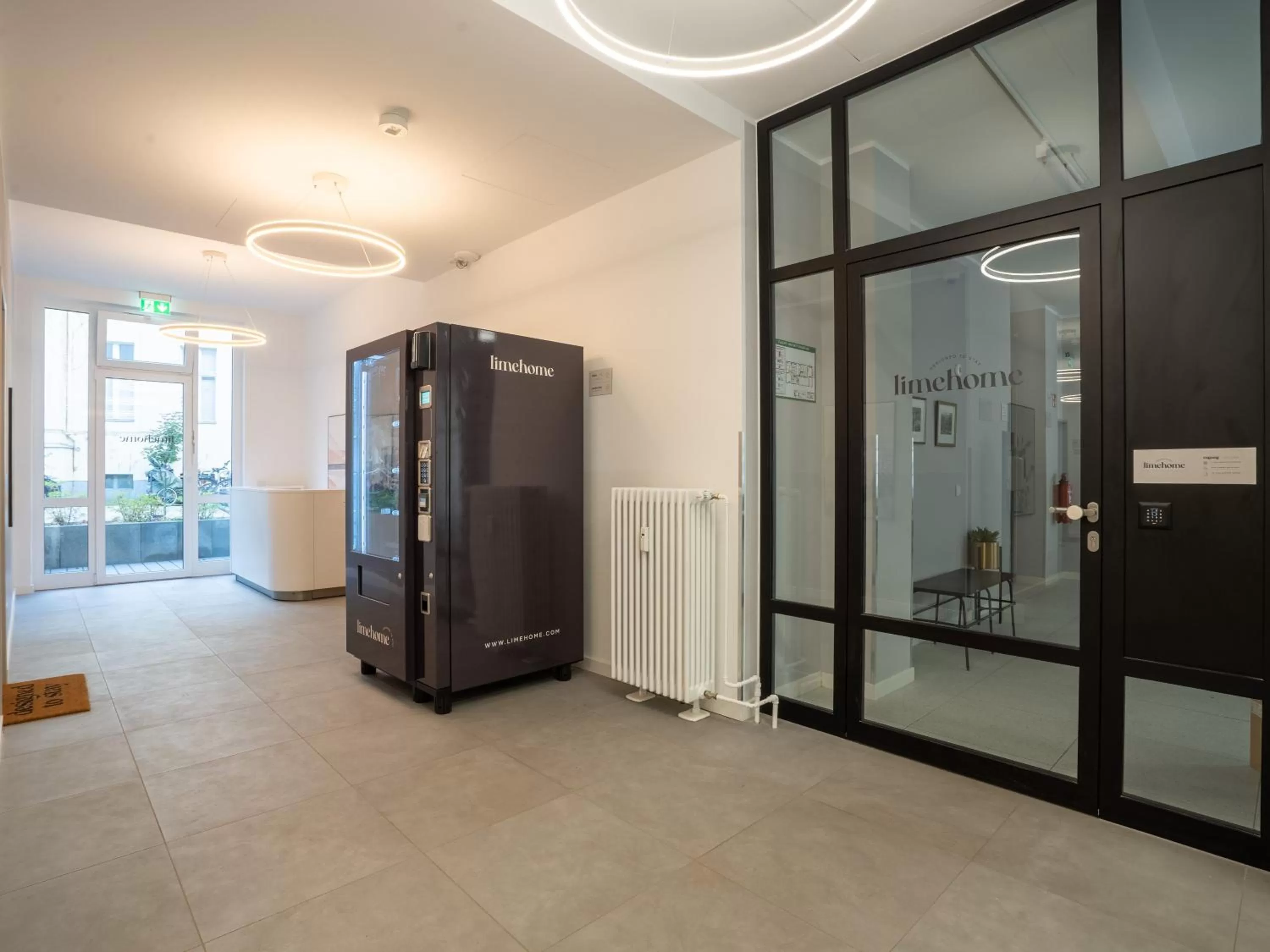 Communal lounge/ TV room in Limehome Berlin Luise Henriette Str - Digital Access