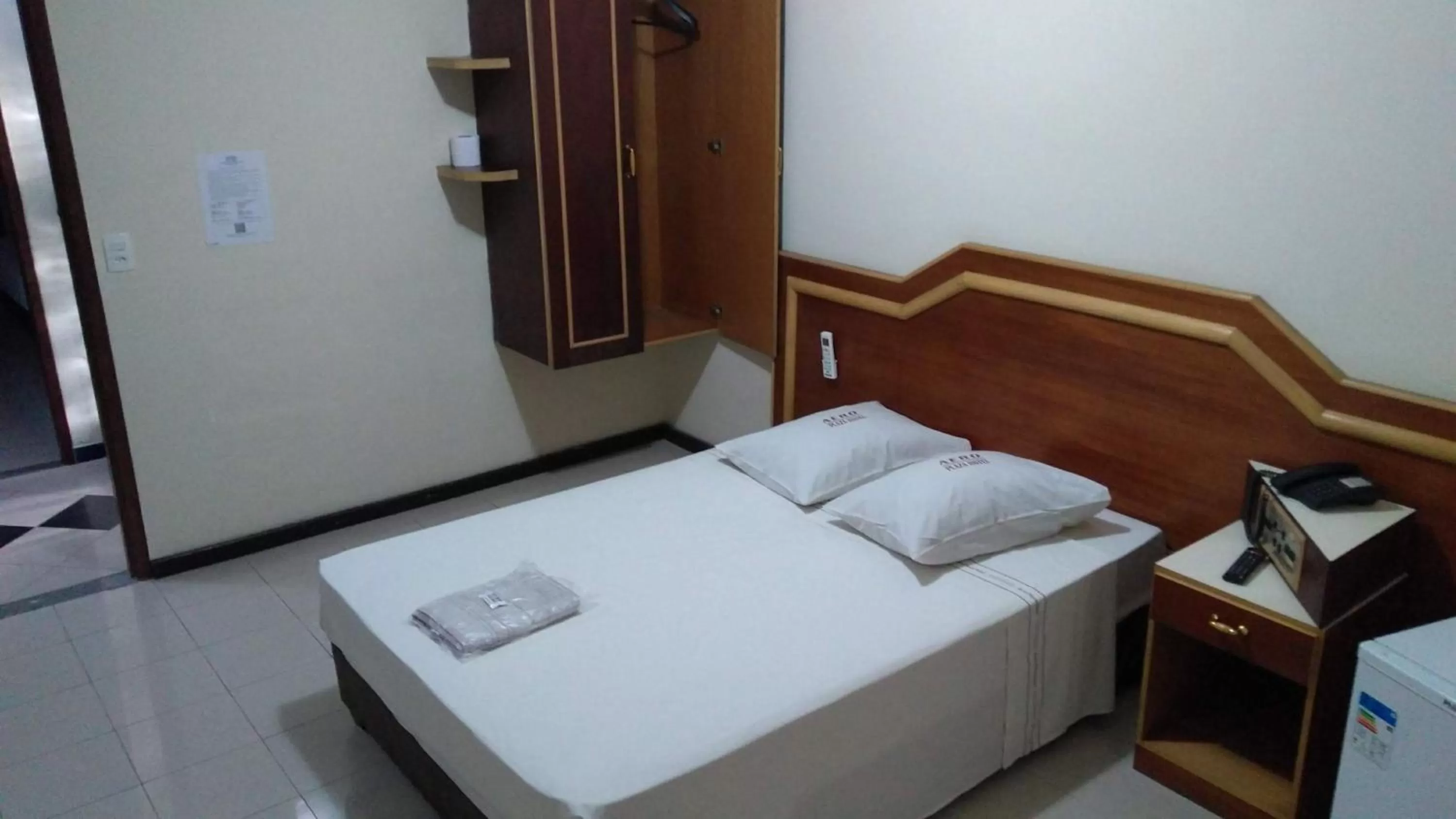 Bed in Aero Plaza Hotel