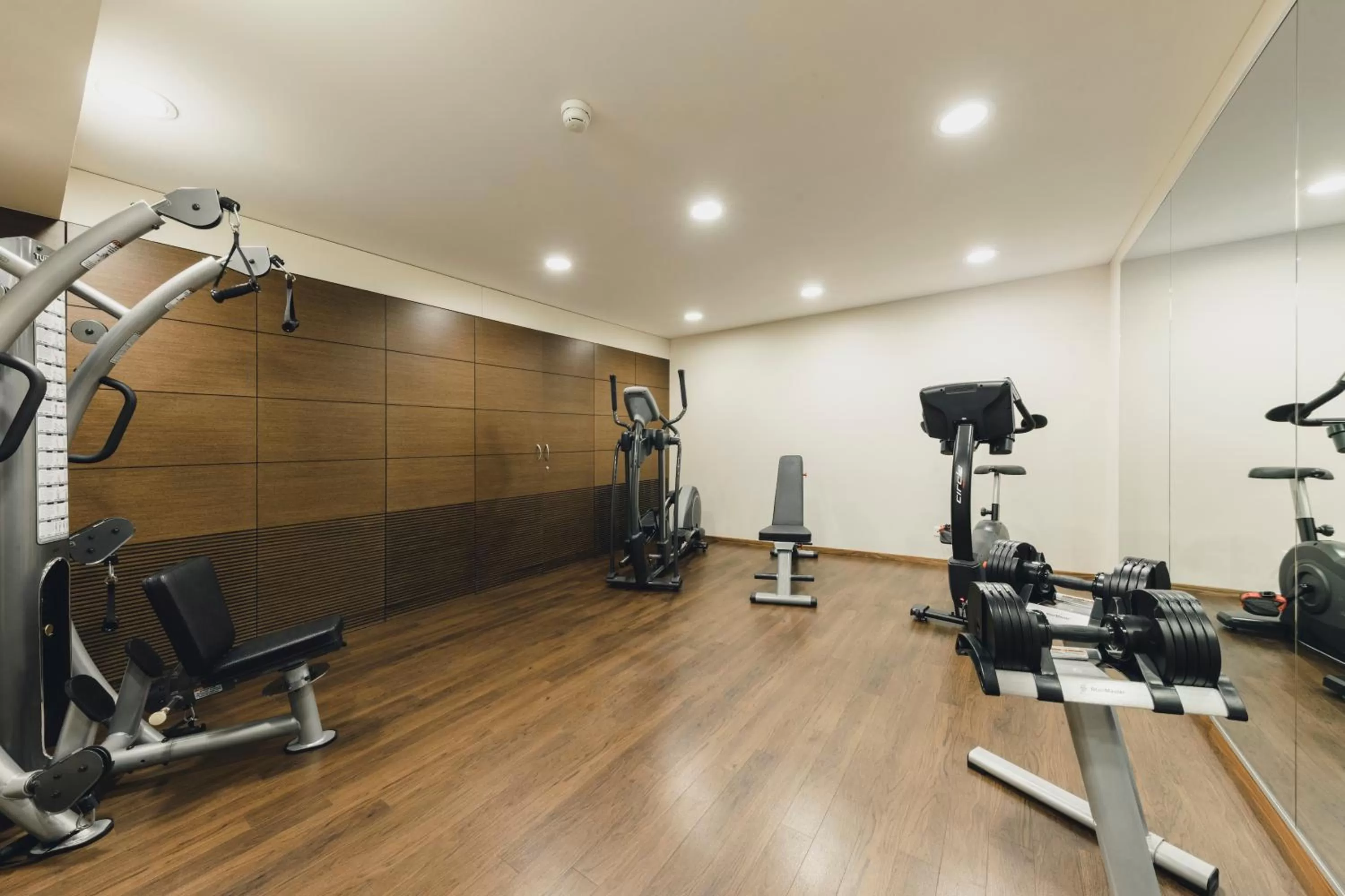 Fitness centre/facilities in Central by Residence Hotel
