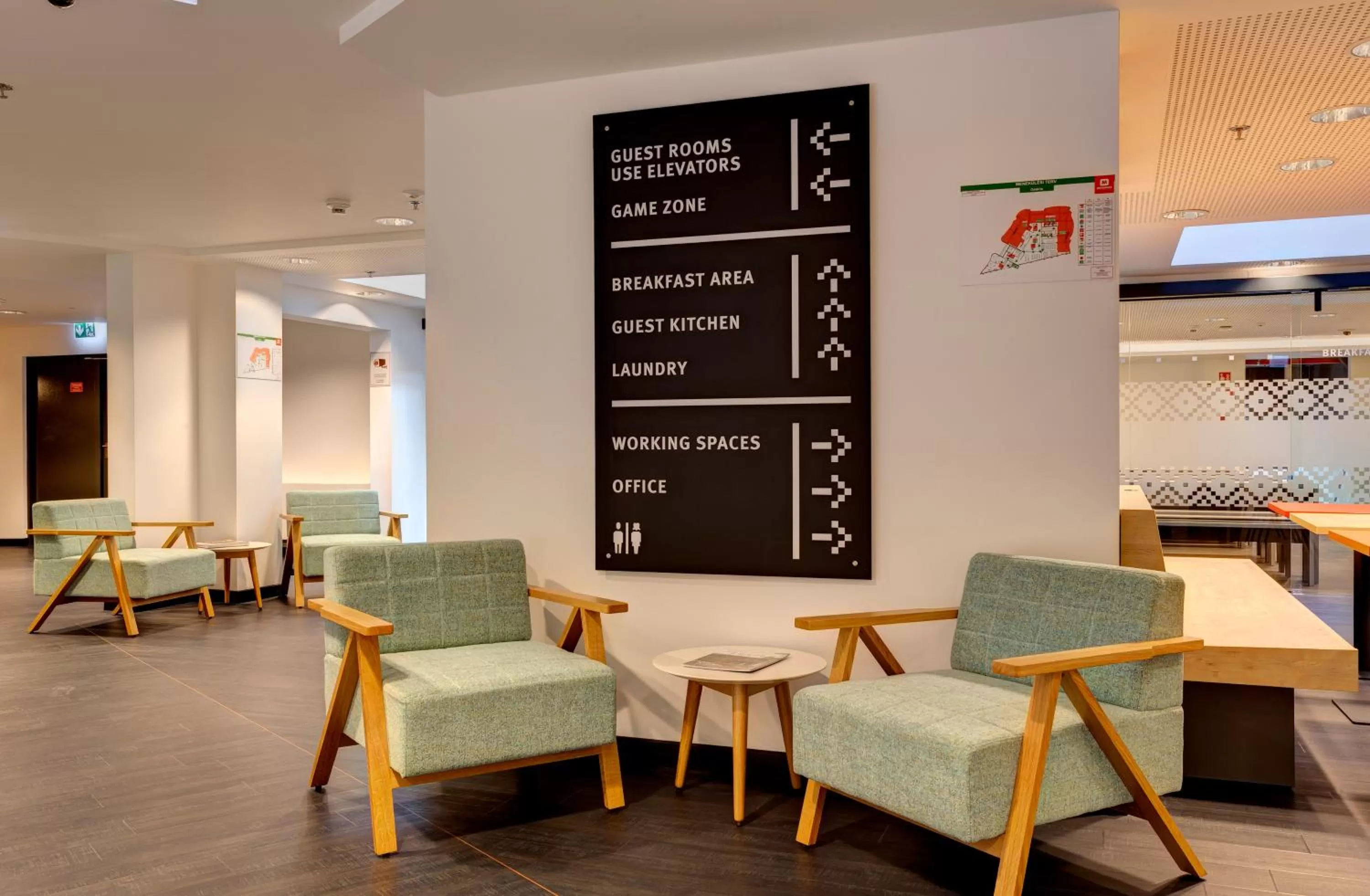 Communal lounge/ TV room in MEININGER Budapest Great Market Hall