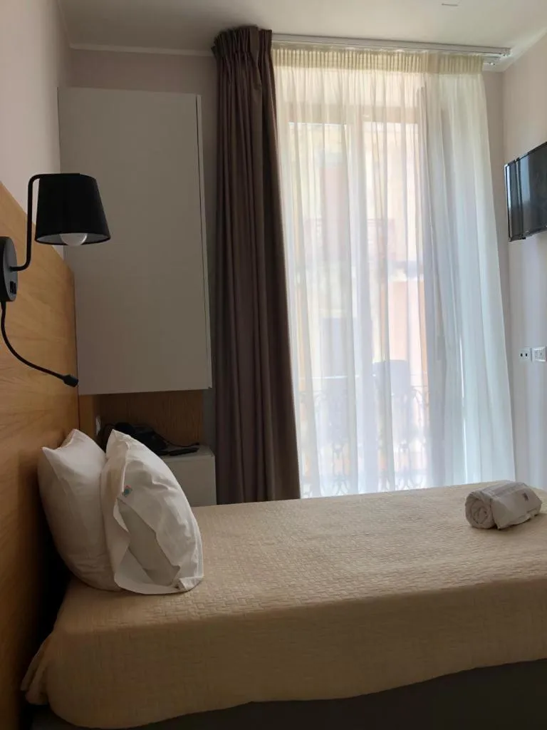 Bed in Albergo Milazzo Inn AiMori