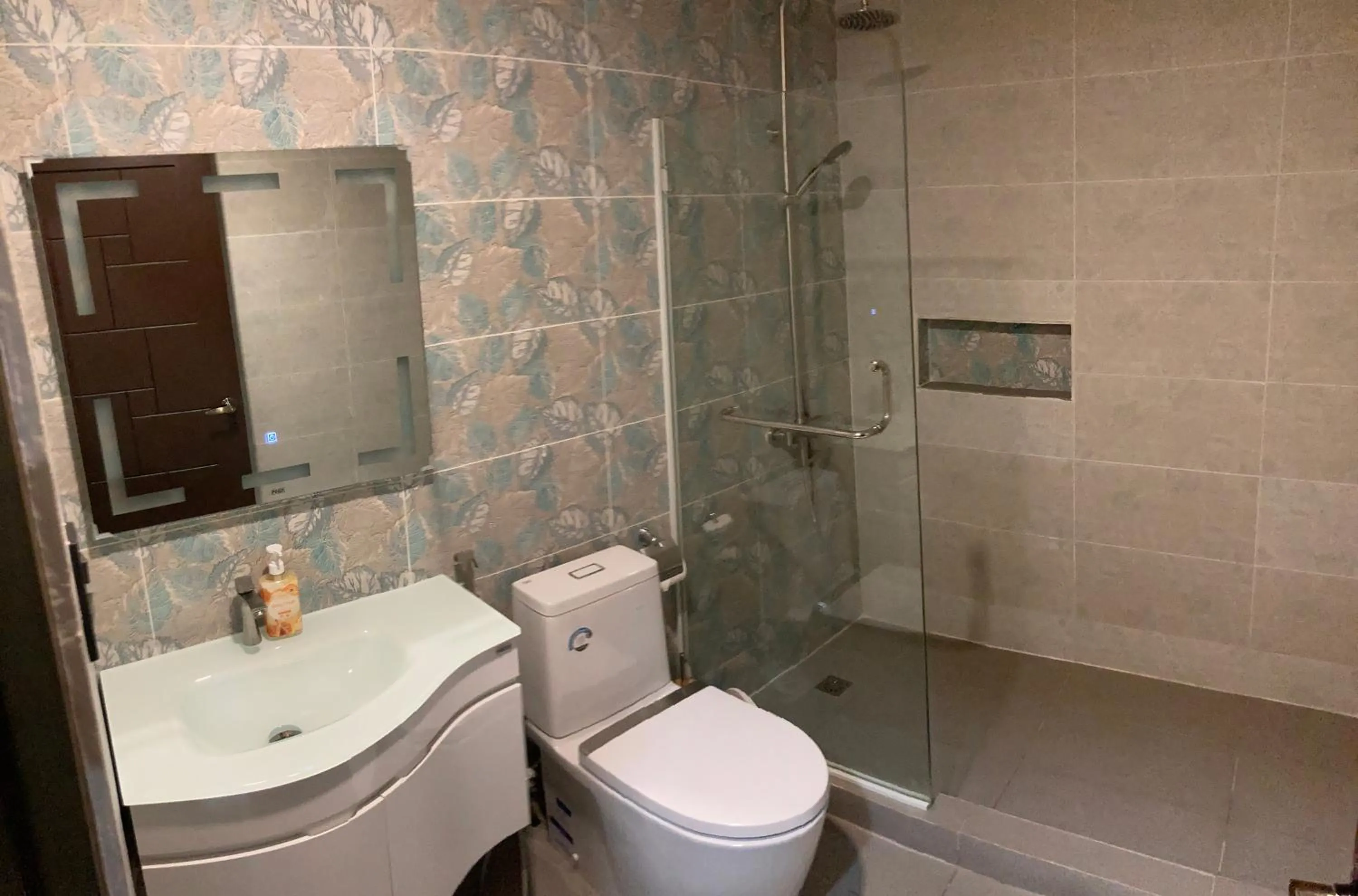 Bathroom in Sunset At Aninuan Beach Resort