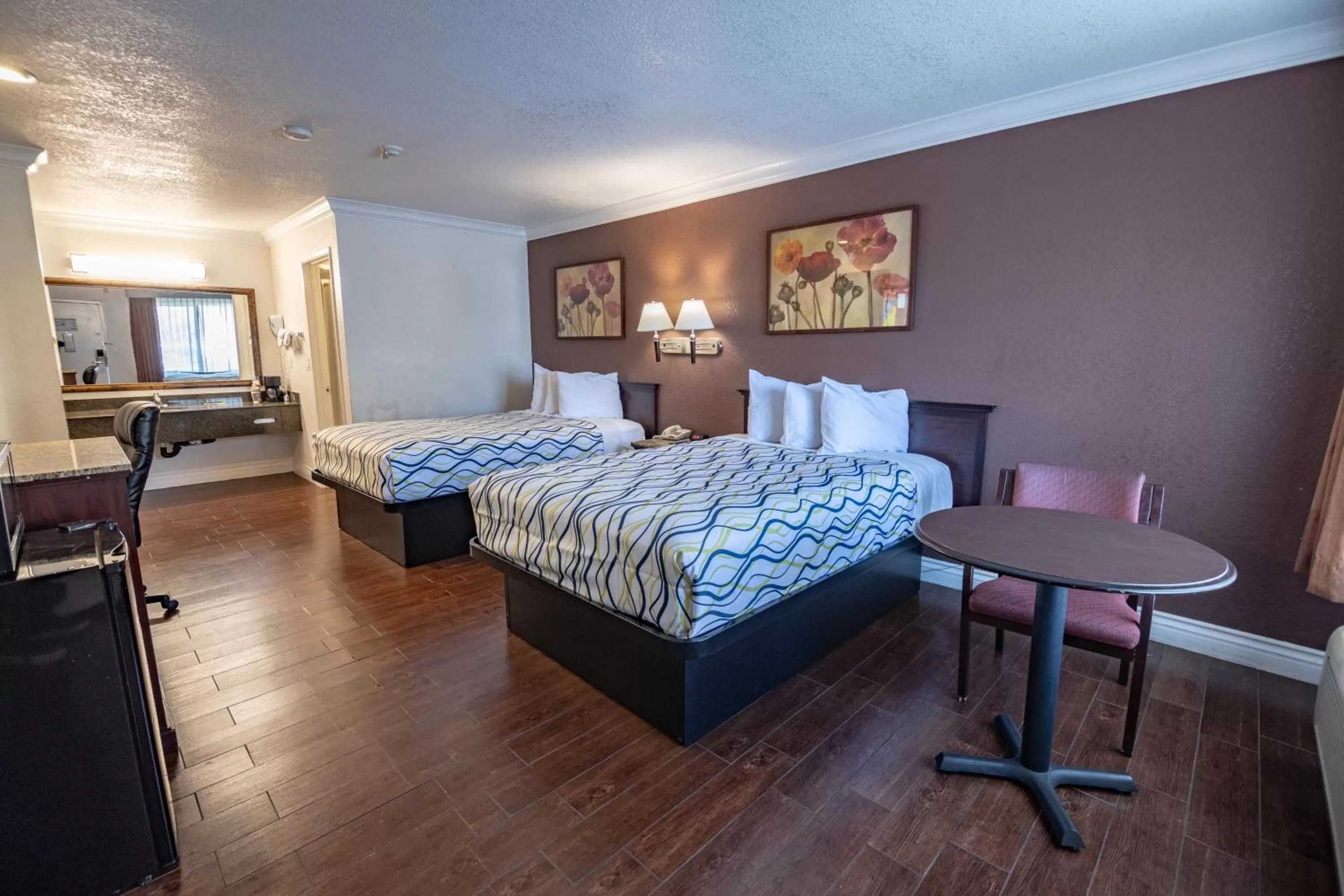 Bed in Hospitality Inn