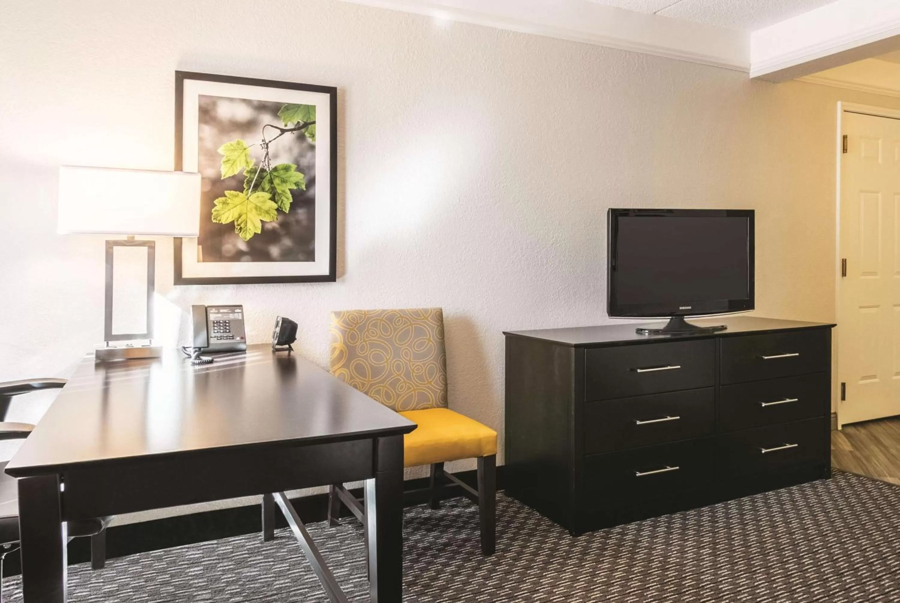 Photo of the whole room in La Quinta by Wyndham Orlando Airport North - Free Airport Shuttle!