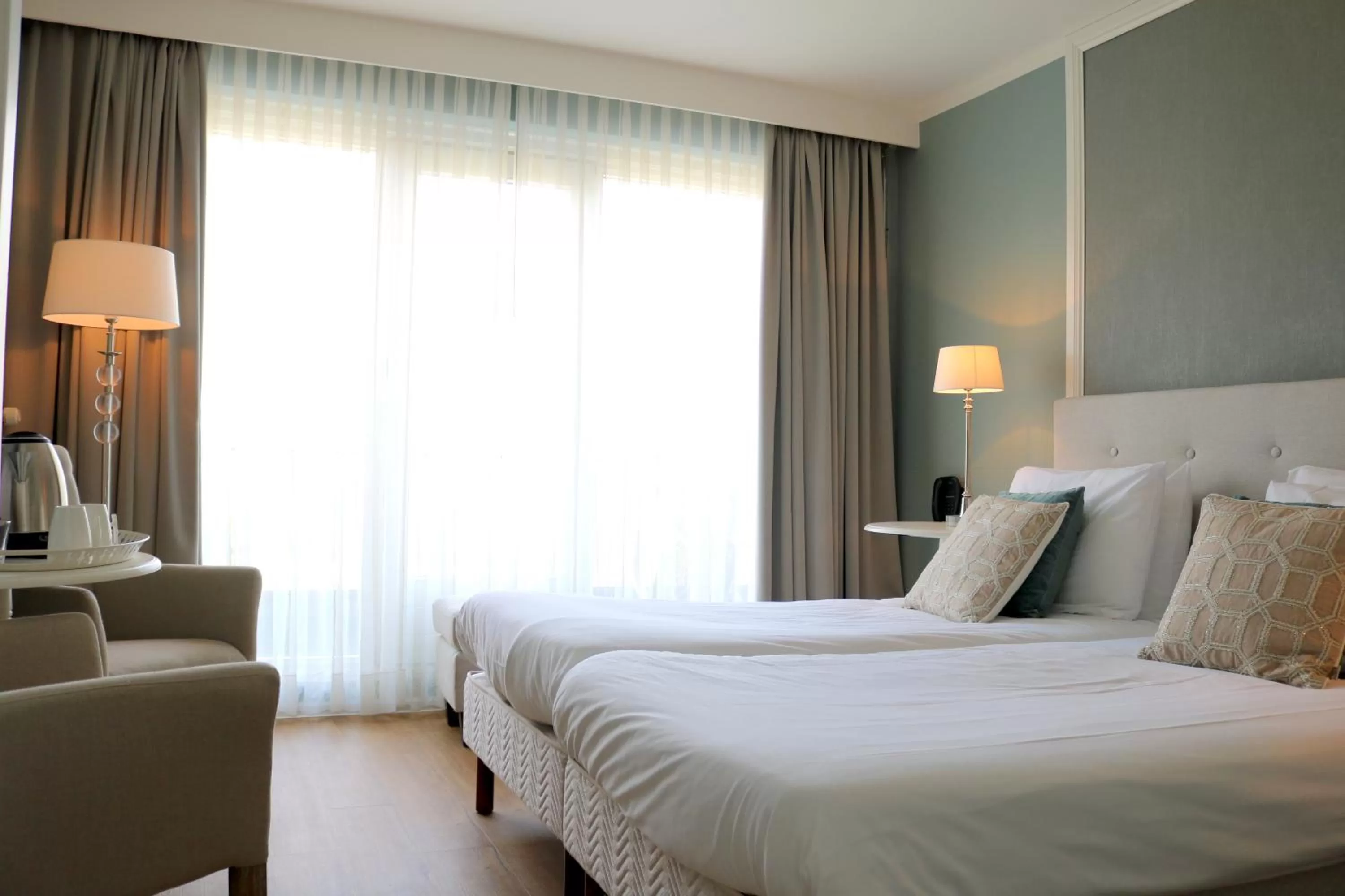 Seating area, Bed in Hotel Brull