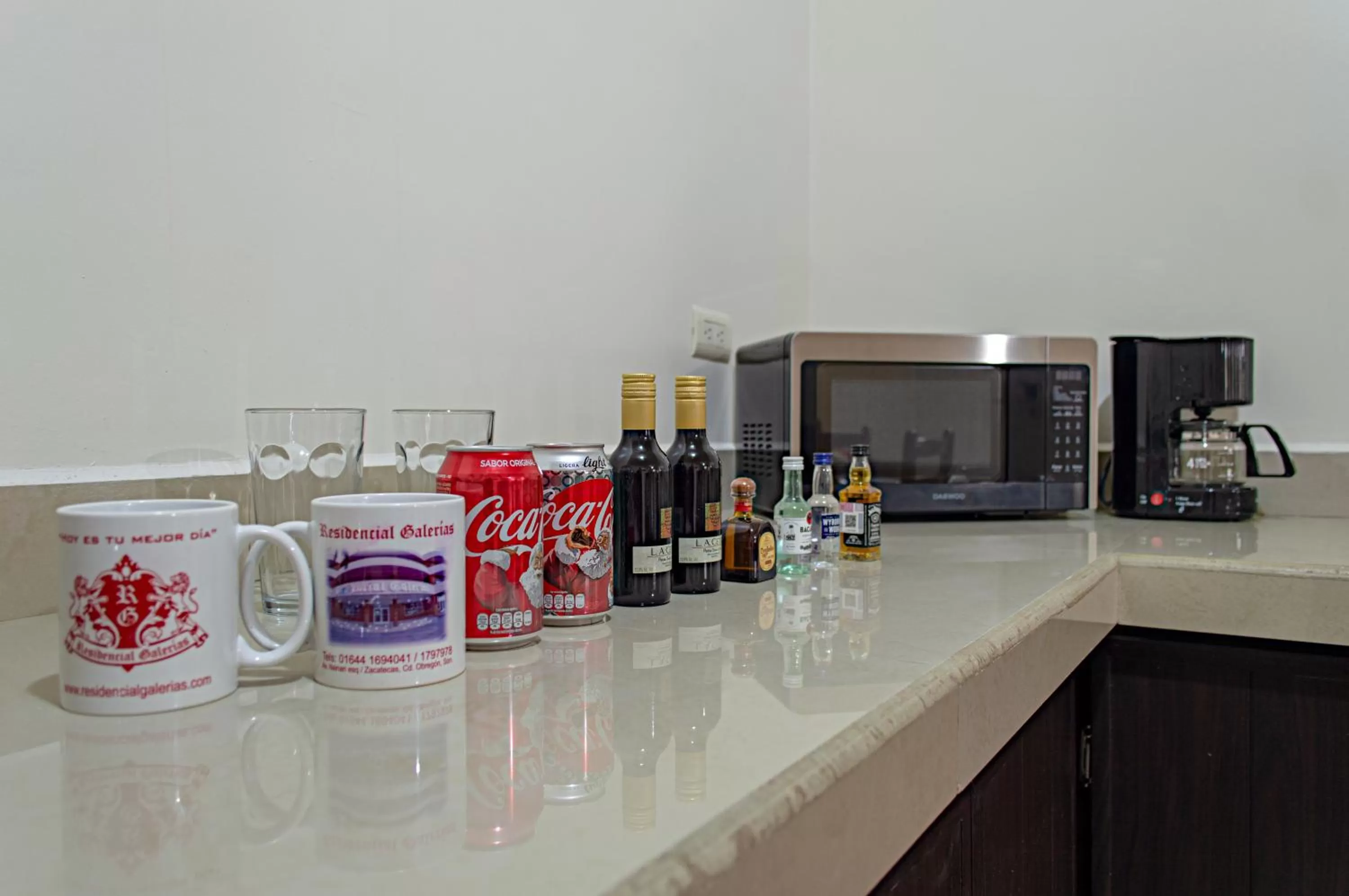 Kitchen or kitchenette in Gran Hotel Residencial Galerias