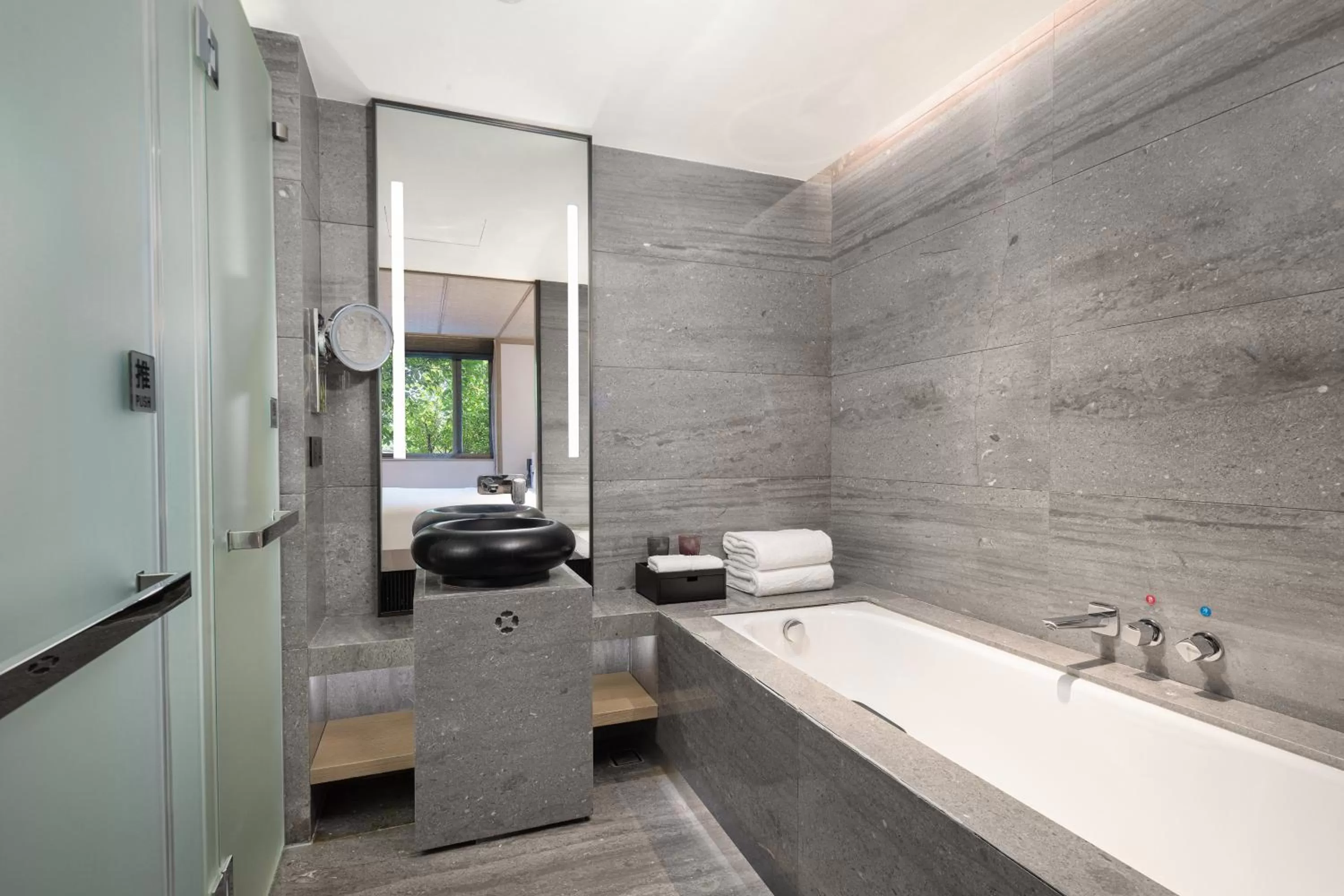 Bathroom in HUALUXE Xi'an Tanghua by IHG