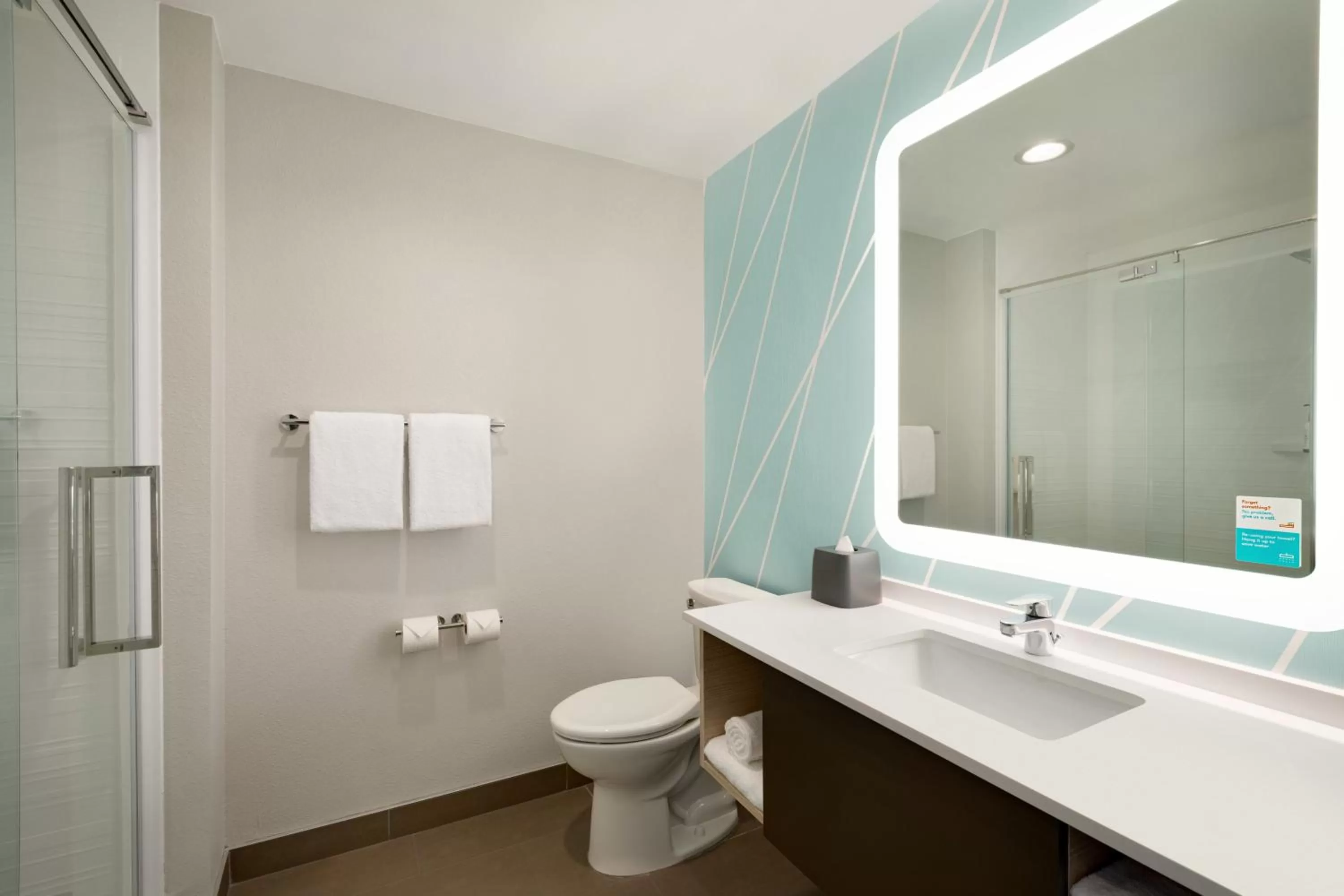 Bathroom in Avid Hotels - Denver Airport Area by IHG