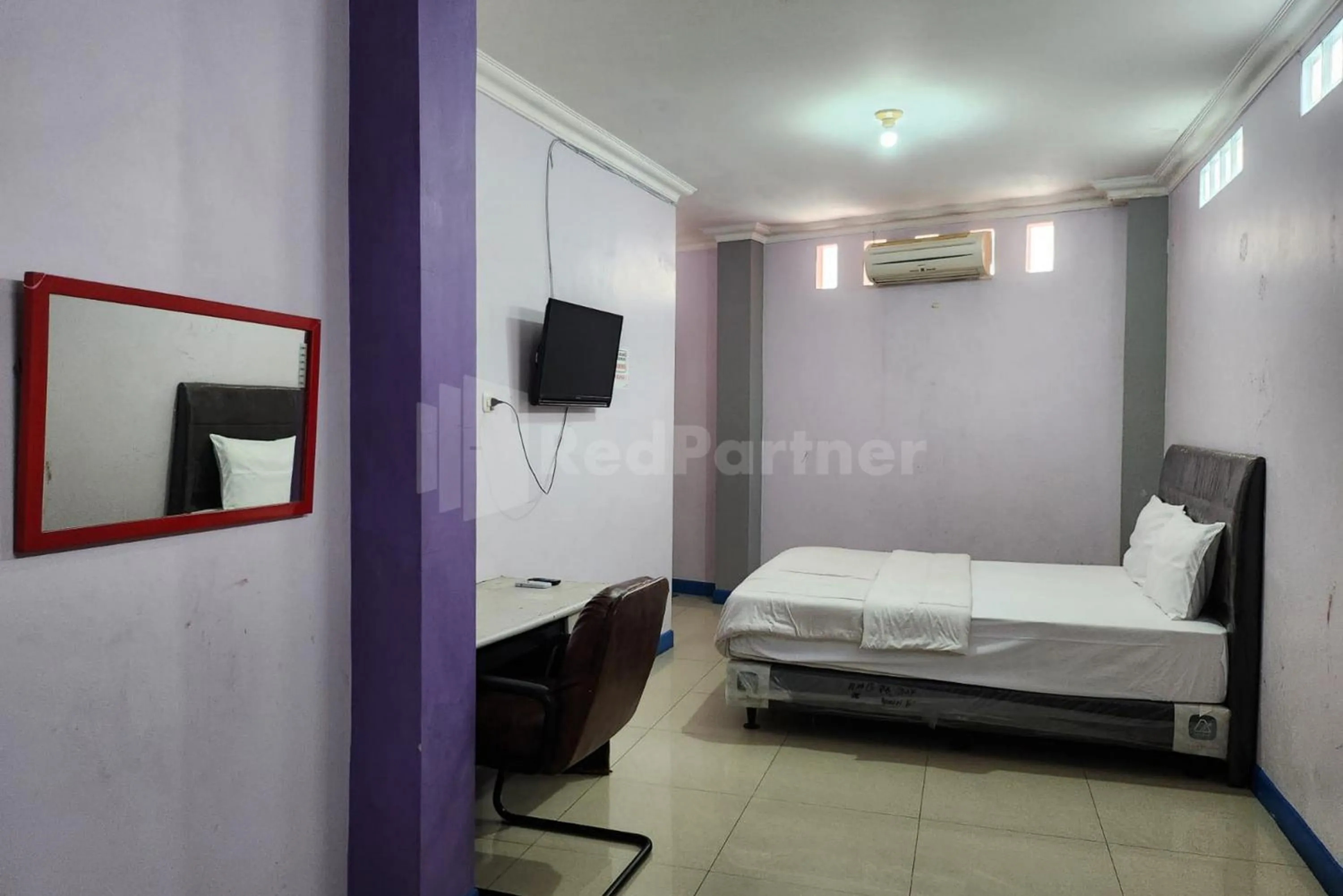 Bed in OYO 1319 Puspita Guesthouse