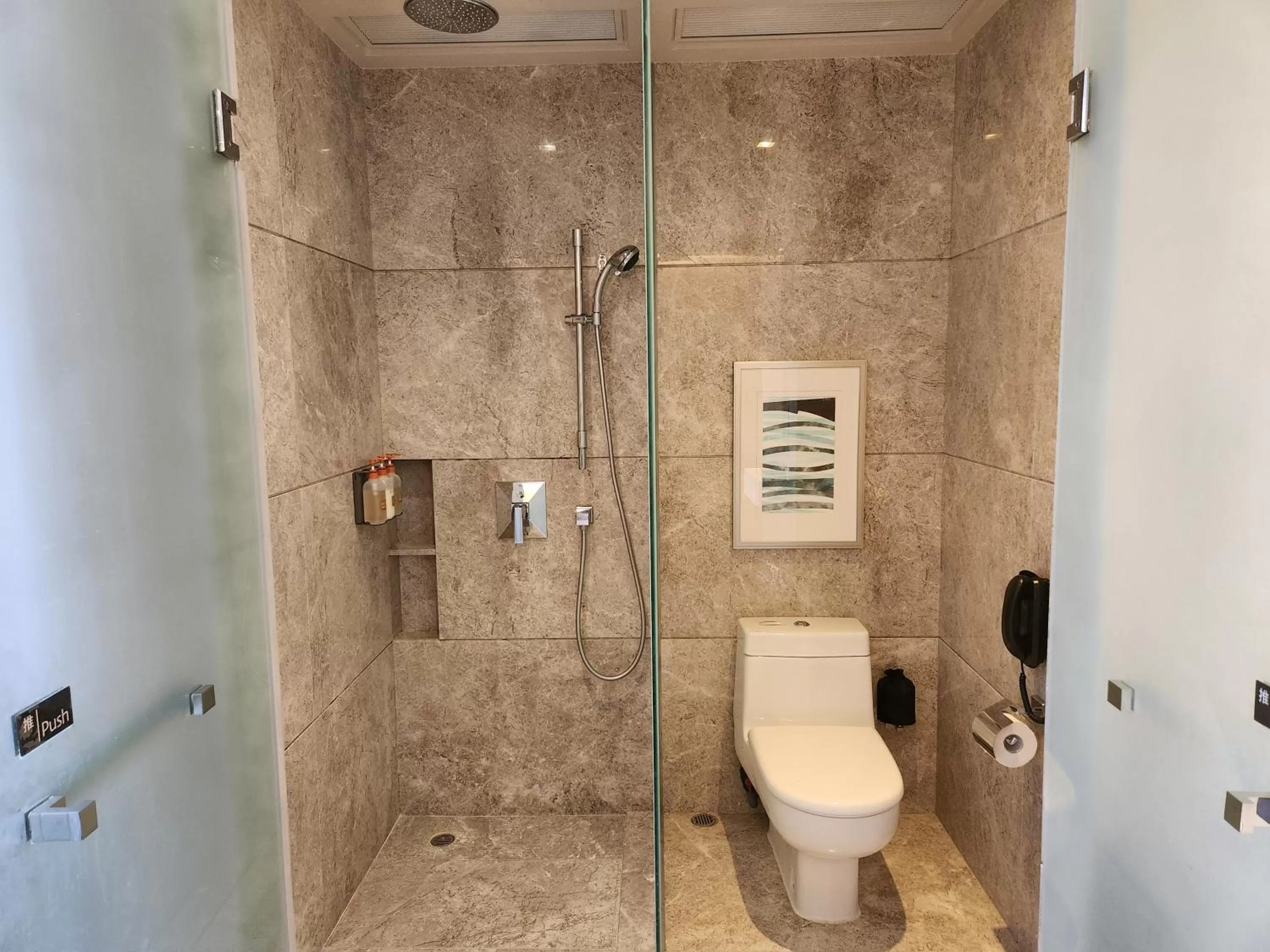 Shower in Crowne Plaza Hong Kong Kowloon East by IHG