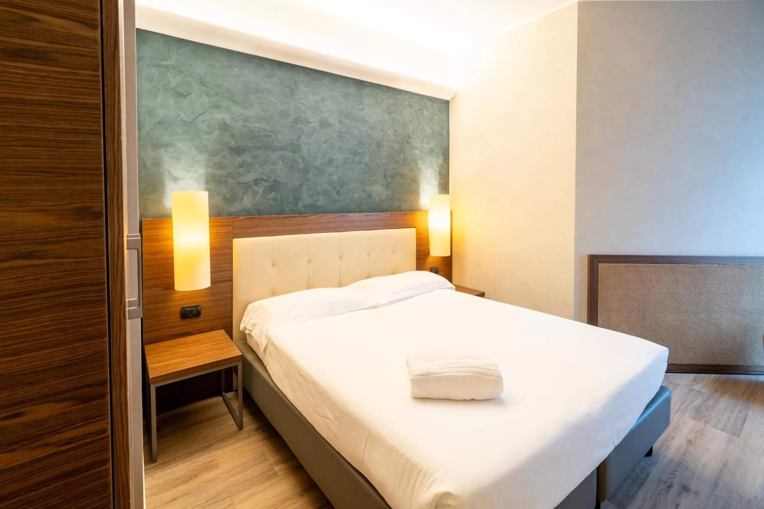 Bed in Hotel Des Etrangers