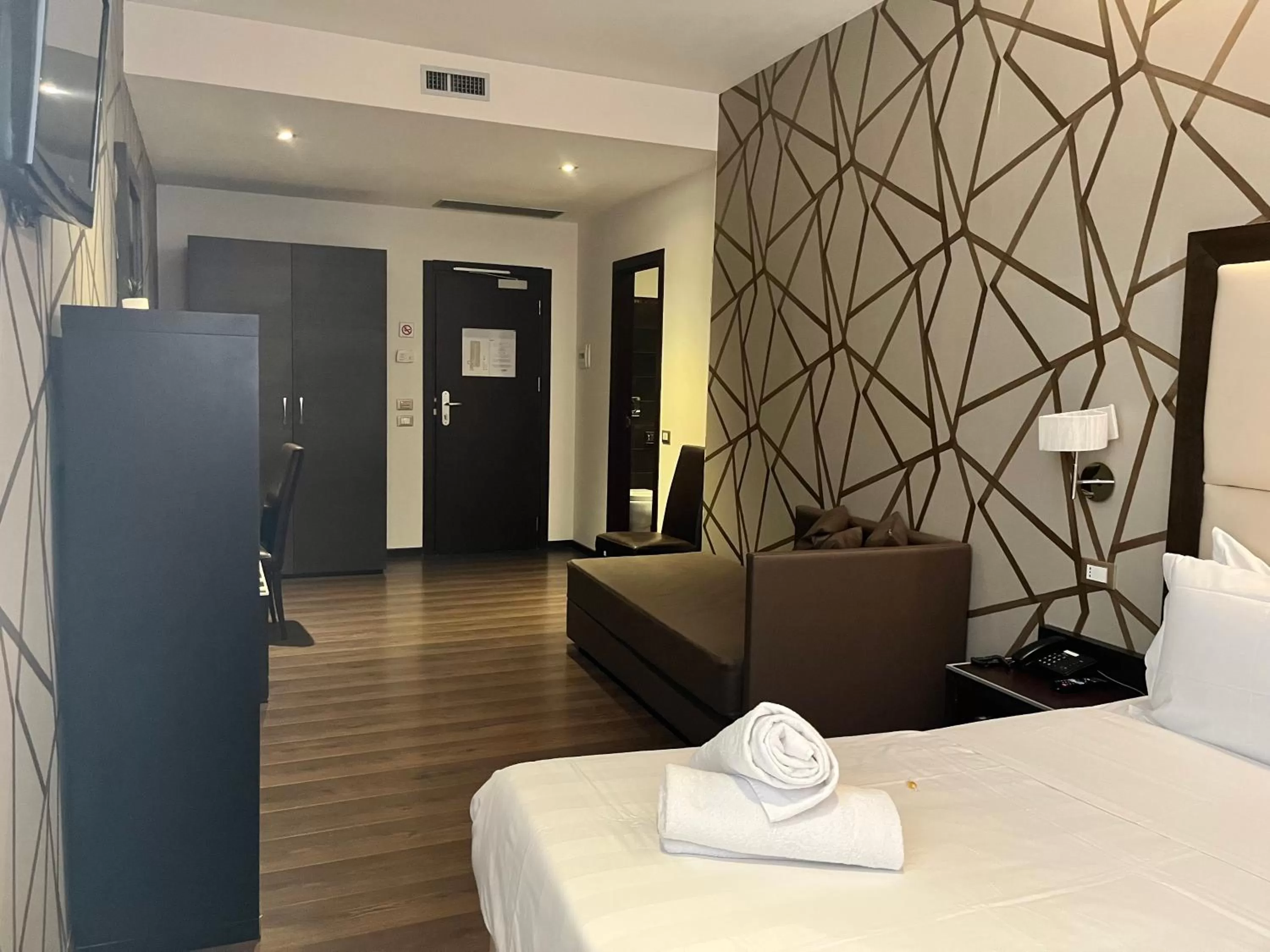 Bedroom in Catone District Hotel