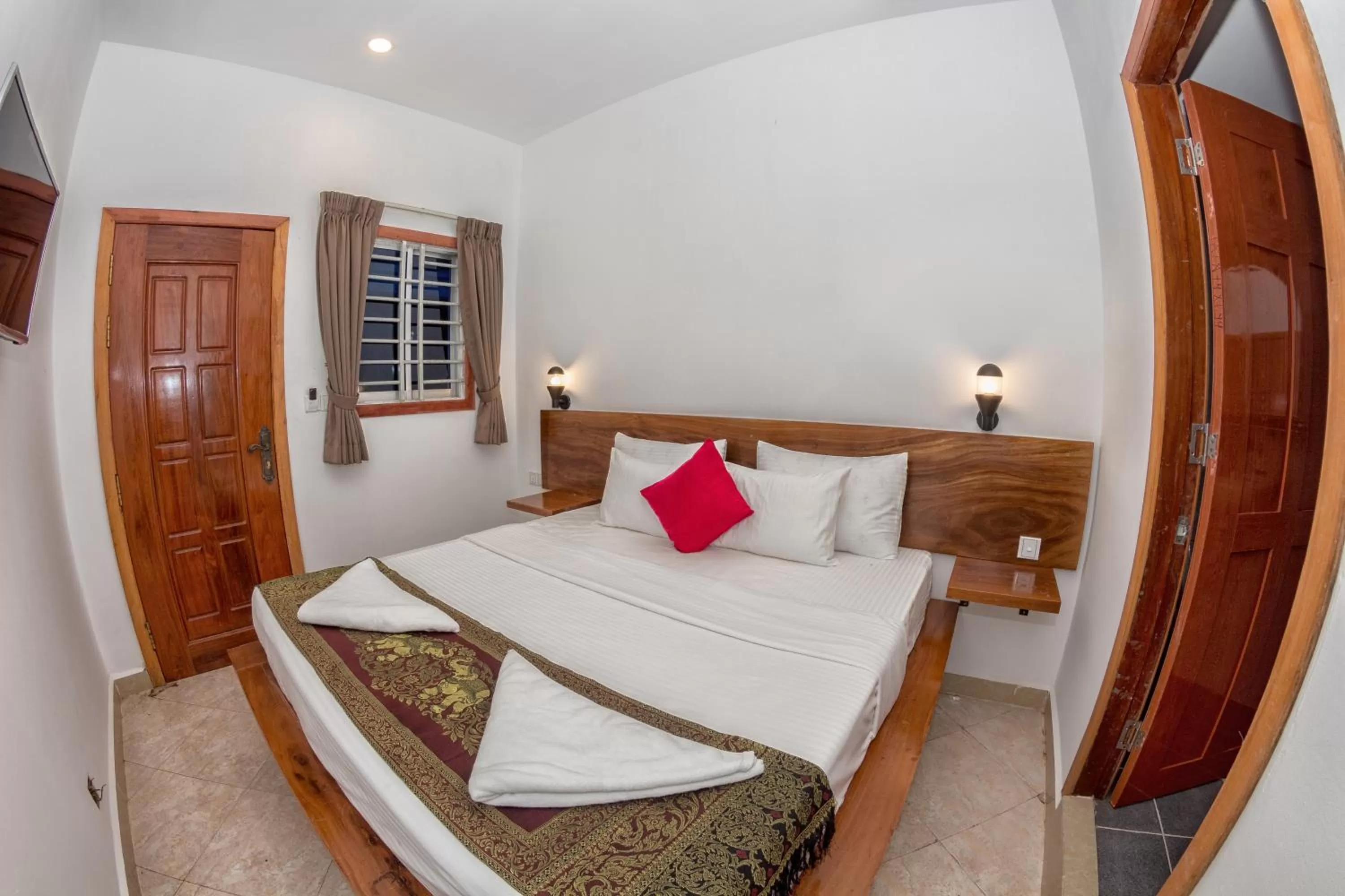 Bed in Poolside Villa