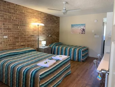 Bed in Golden Beach Motor Inn, Caloundra