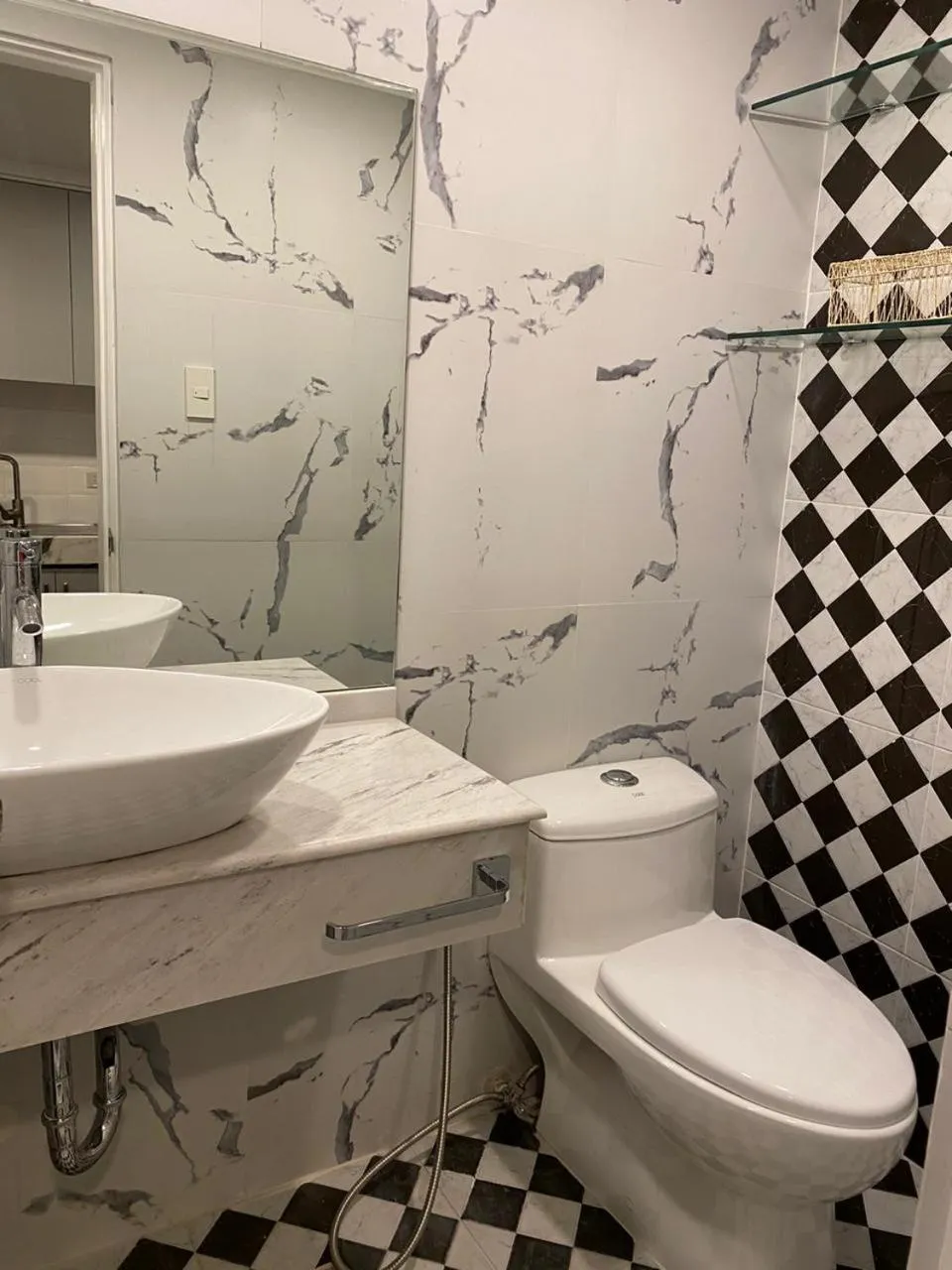 Toilet, Bathroom in Mpt Suites