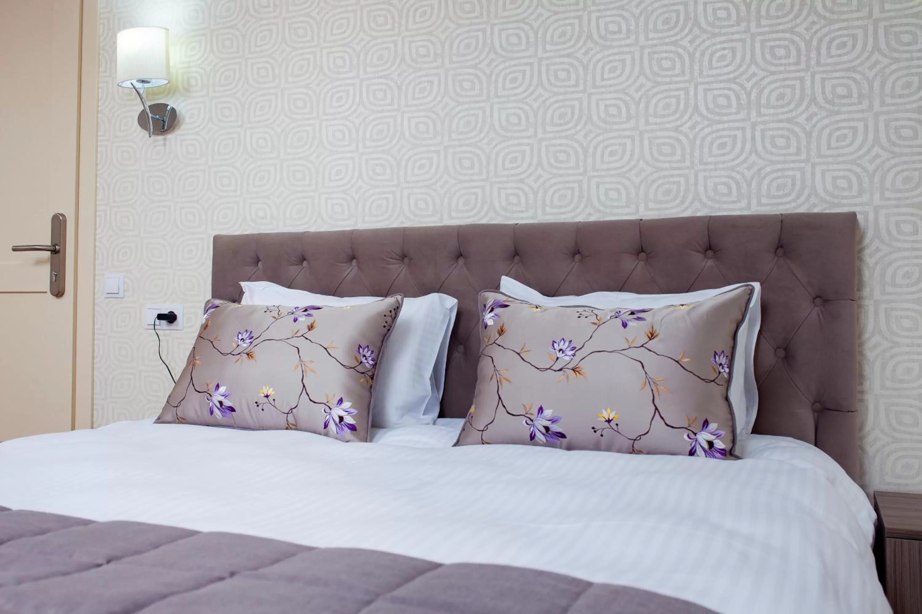 Bed in Familion ApartHotel