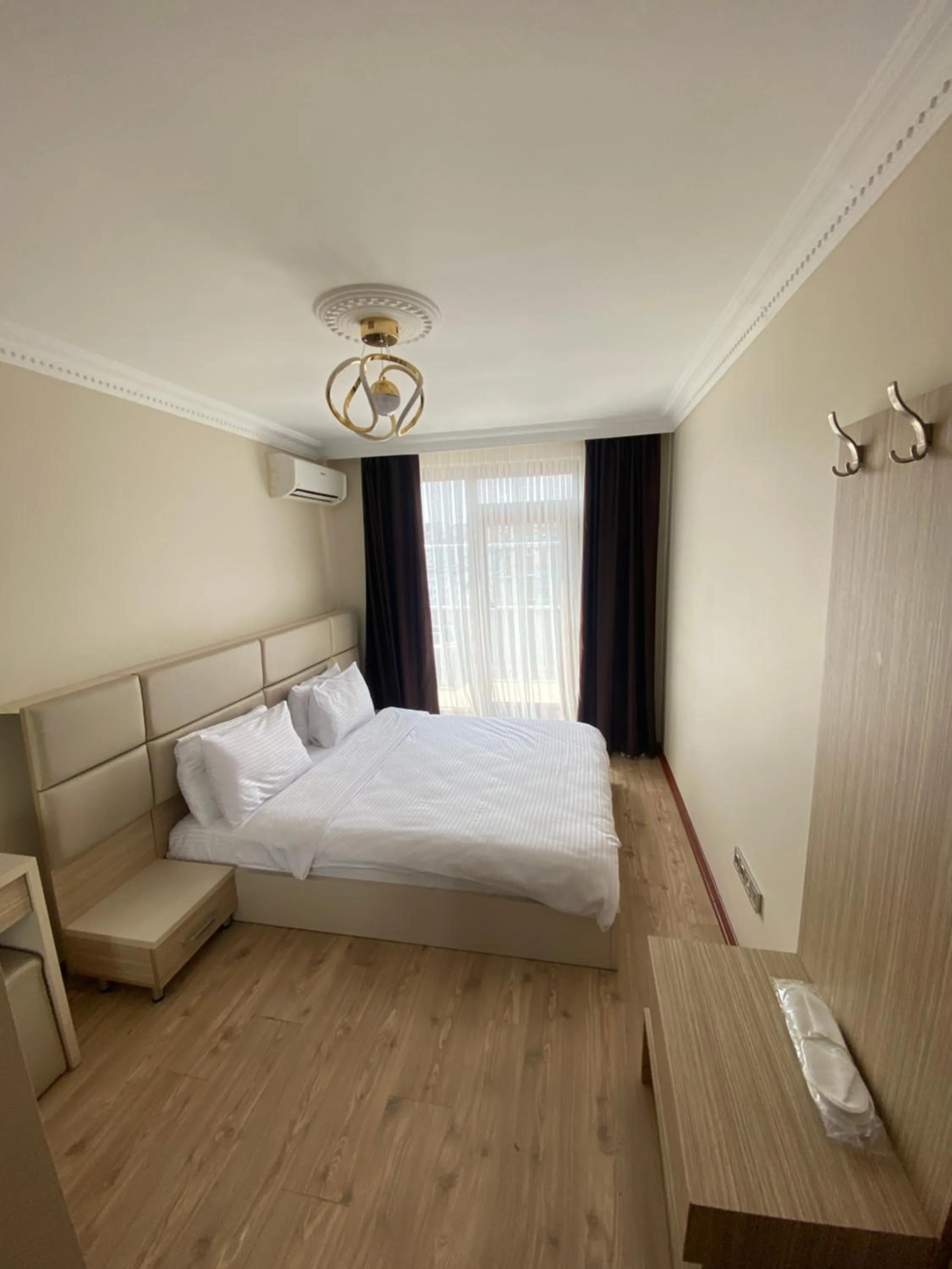 Bed in Overland Residence